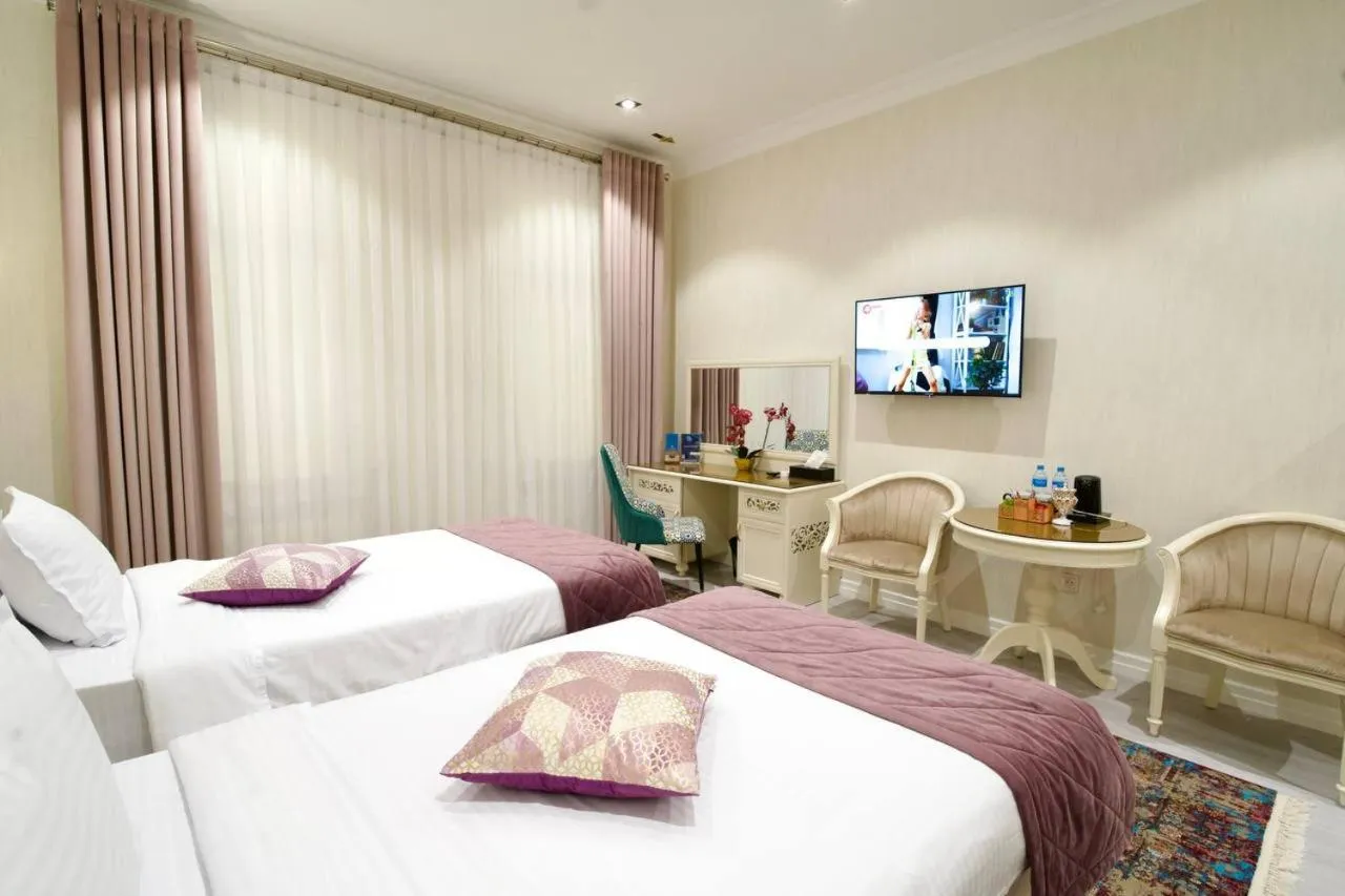 Bed in HOTEL SILK ROAD EMPIRE SAMARKAND