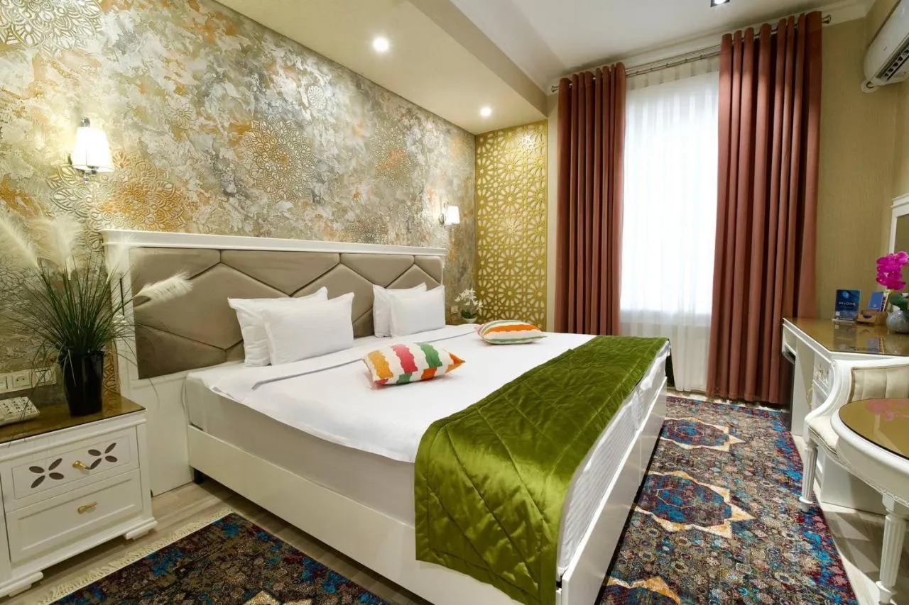 Bed in HOTEL SILK ROAD EMPIRE SAMARKAND
