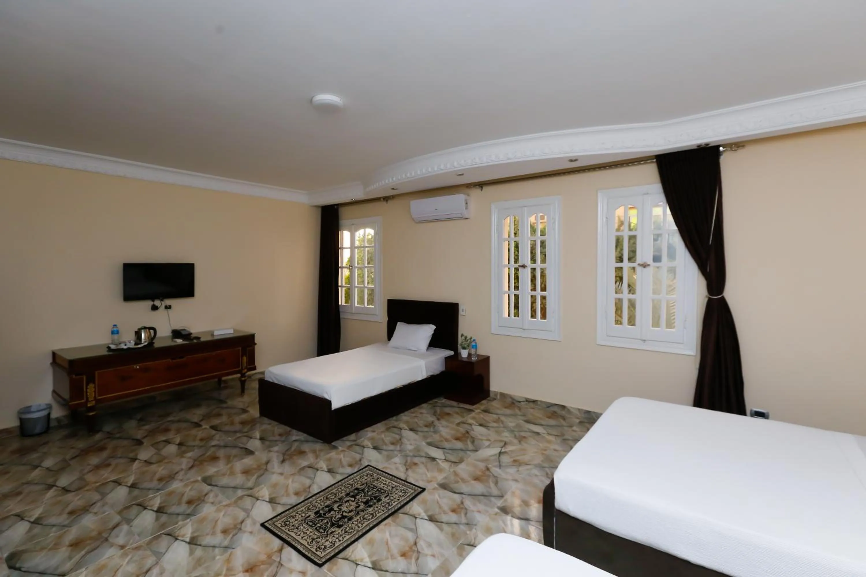 Bed in Turquoise Pyramids palace