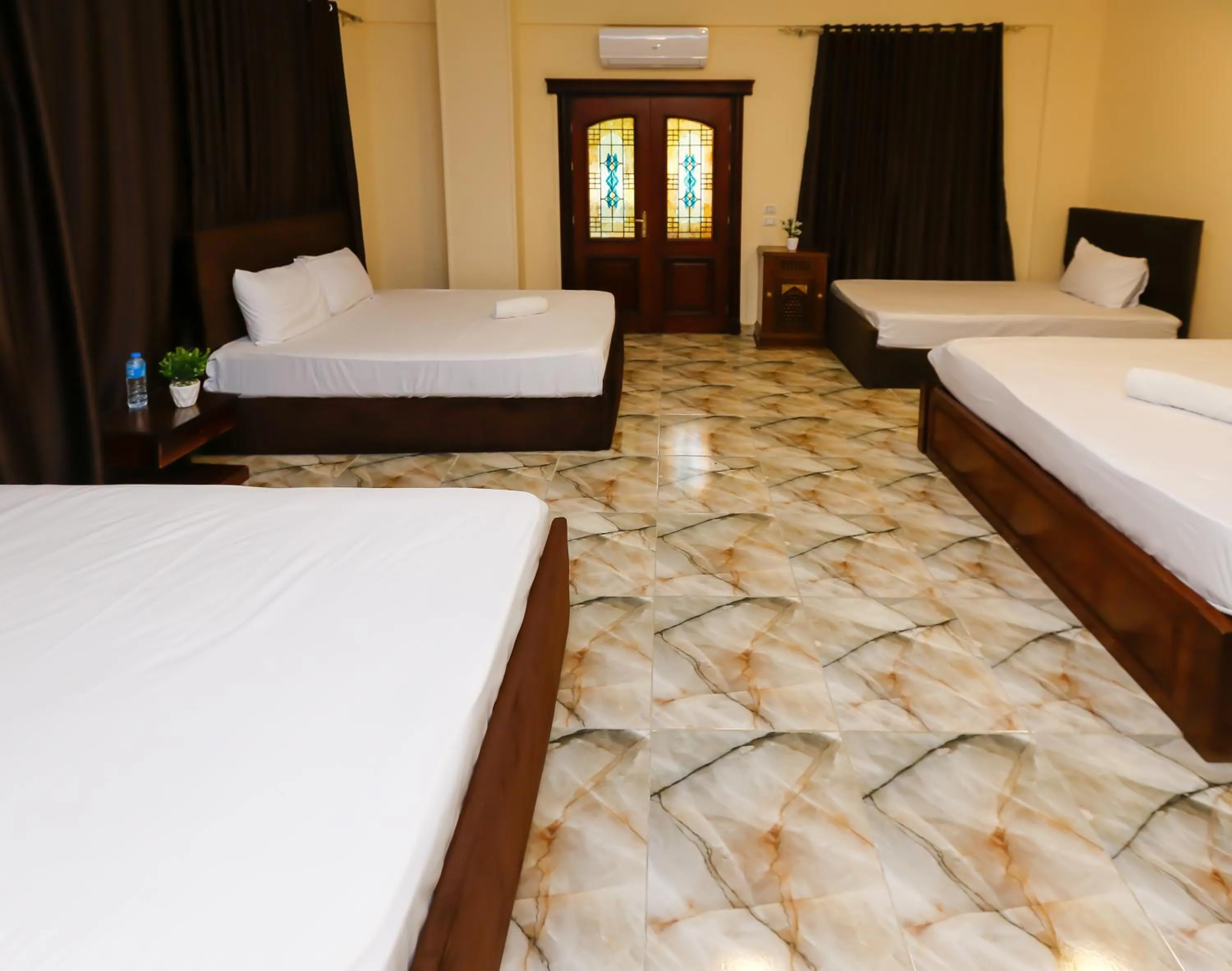 Bed in Turquoise Pyramids palace