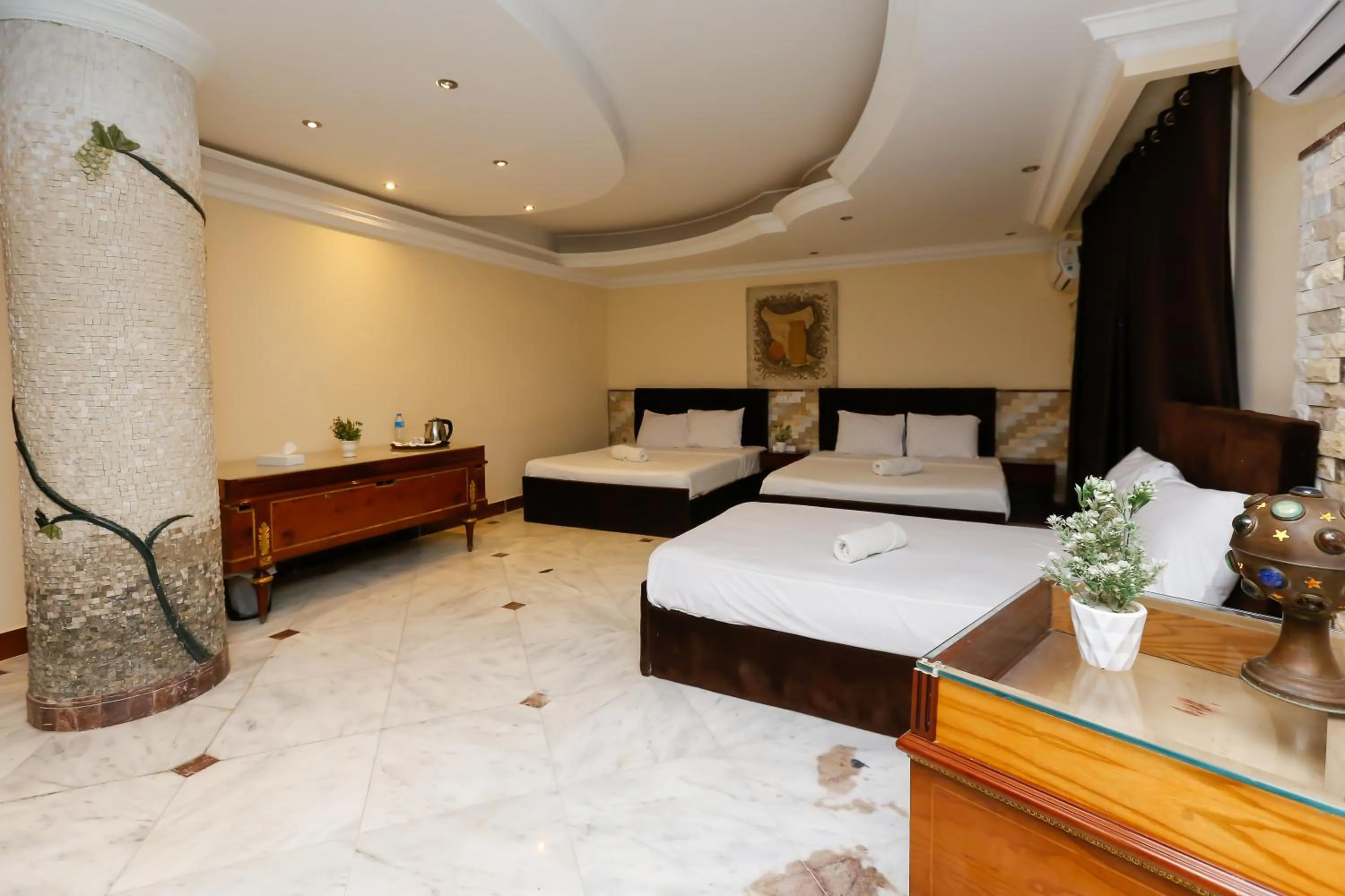 Bed in Turquoise Pyramids palace