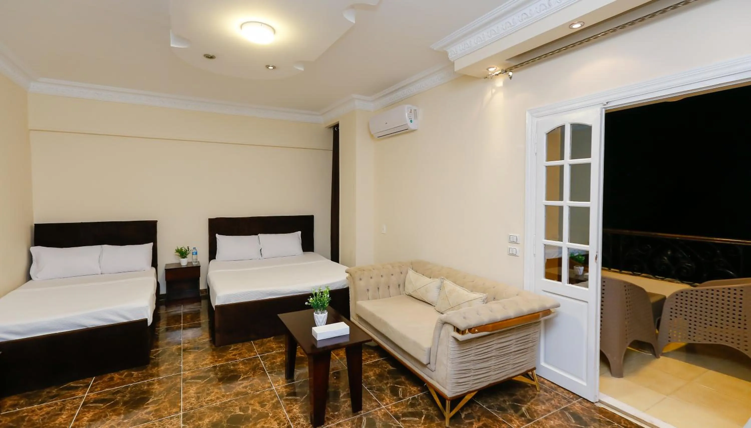 Bed in Turquoise Pyramids palace