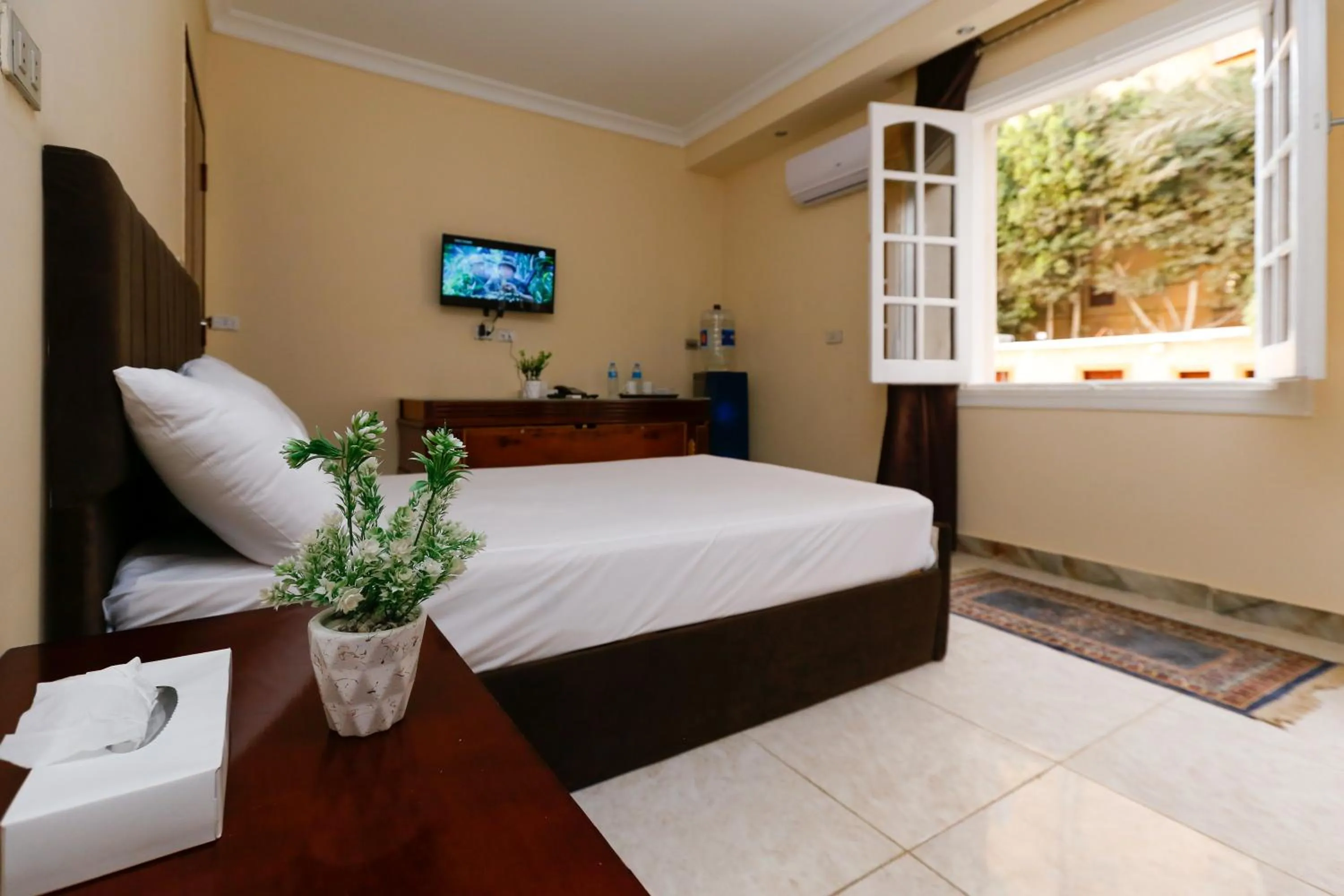 Bed in Turquoise Pyramids palace