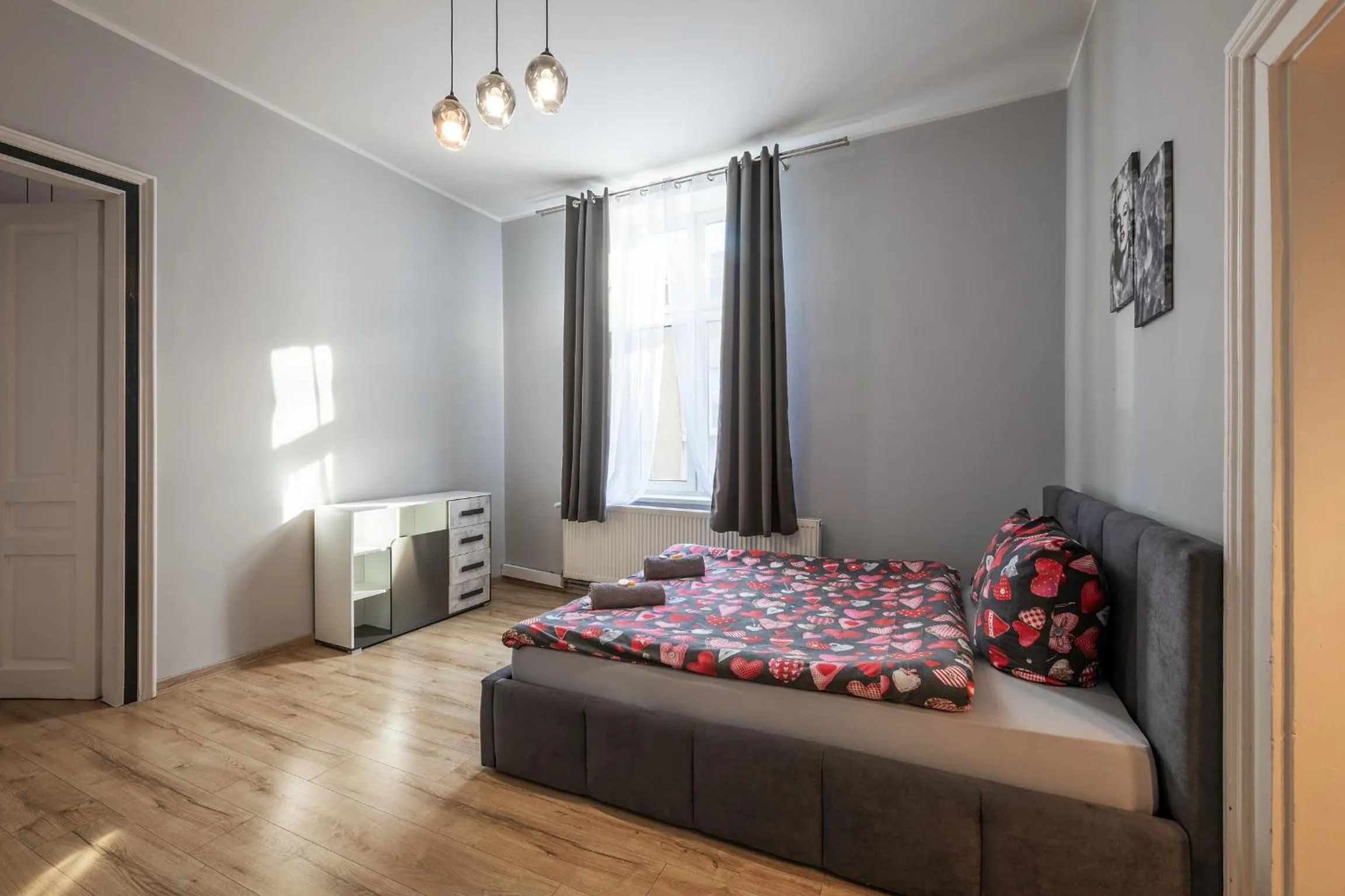 Bed in Queen Apartments