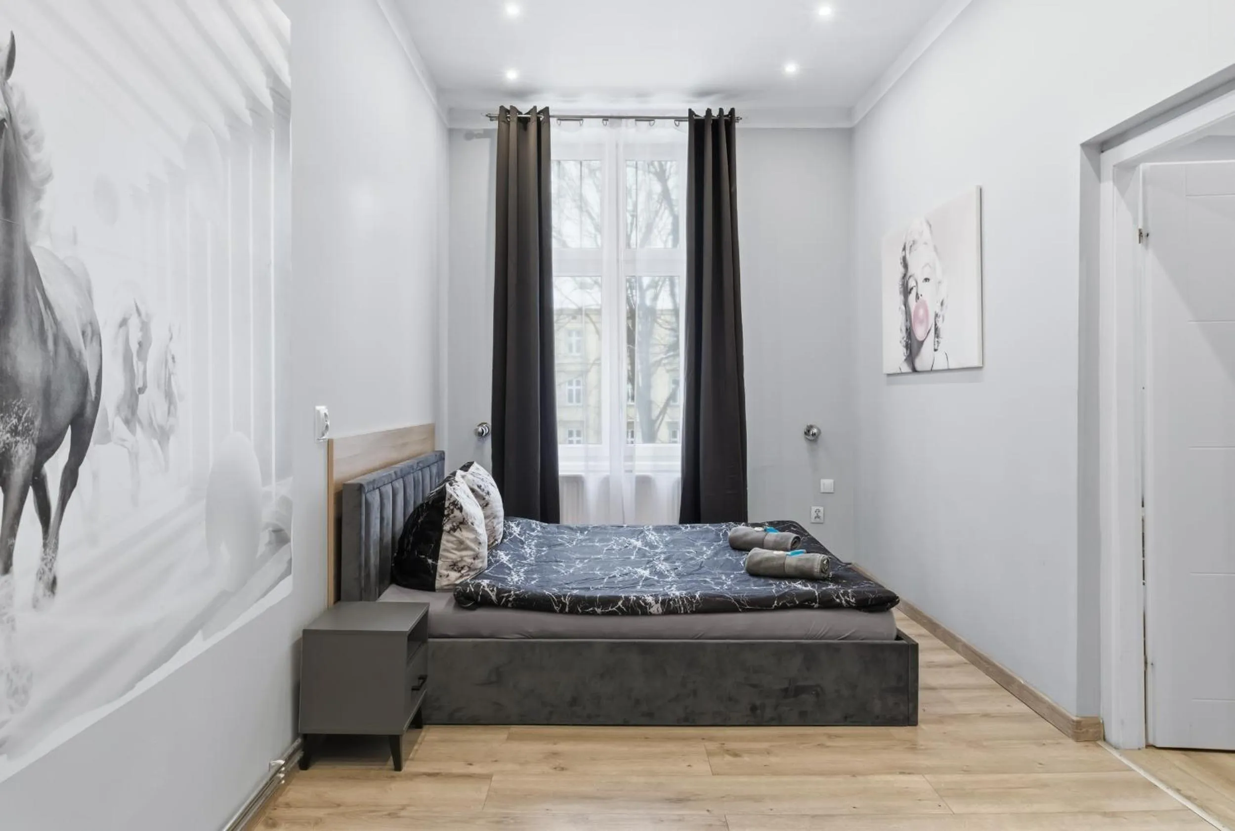 Bed in Queen Apartments