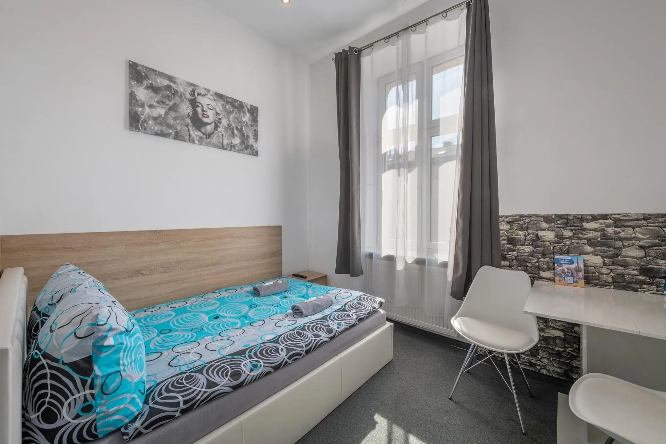 Bed in Queen Apartments