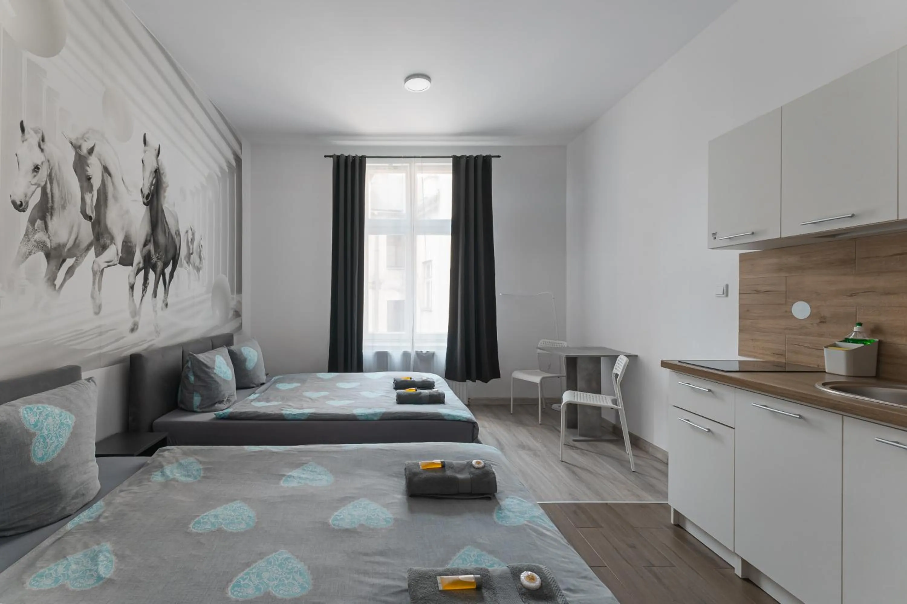 Bed in Queen Apartments