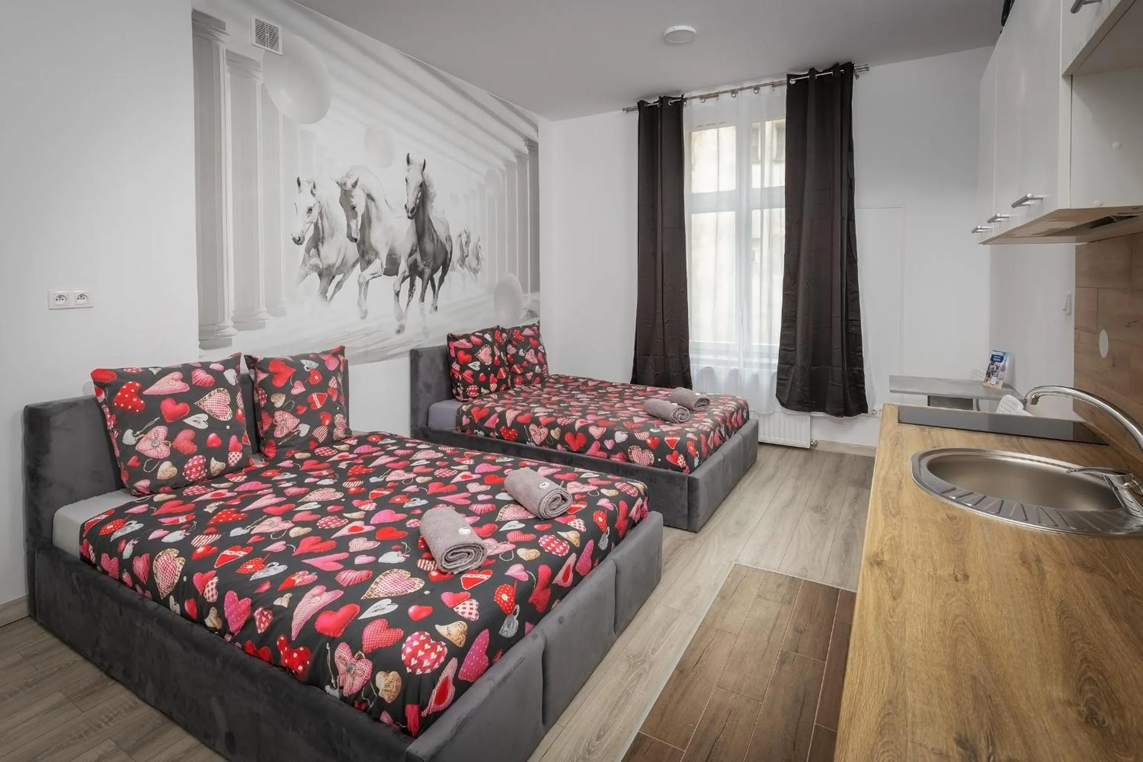 Bed in Queen Apartments