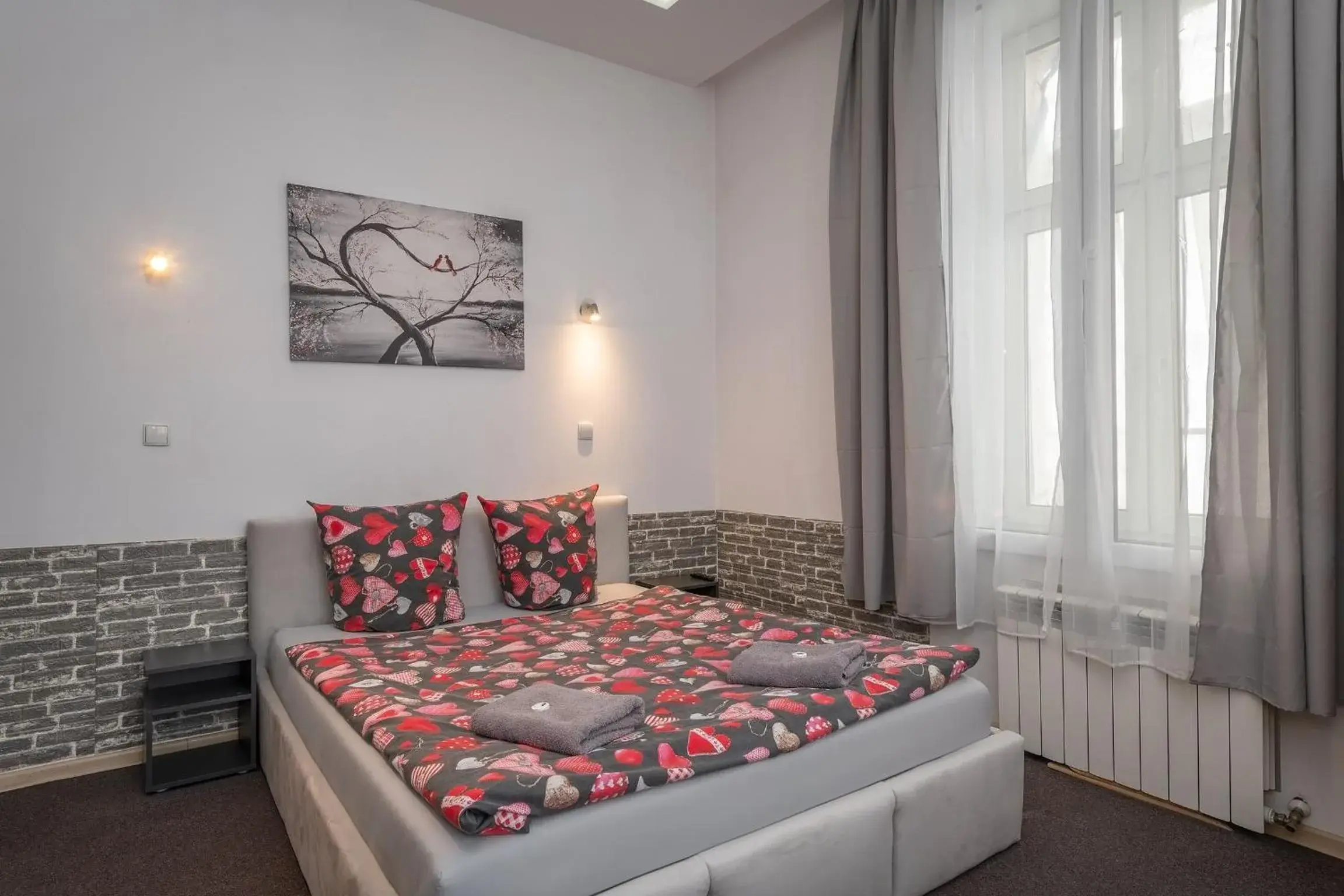 Bed in Queen Apartments Bed in Queen Apartments