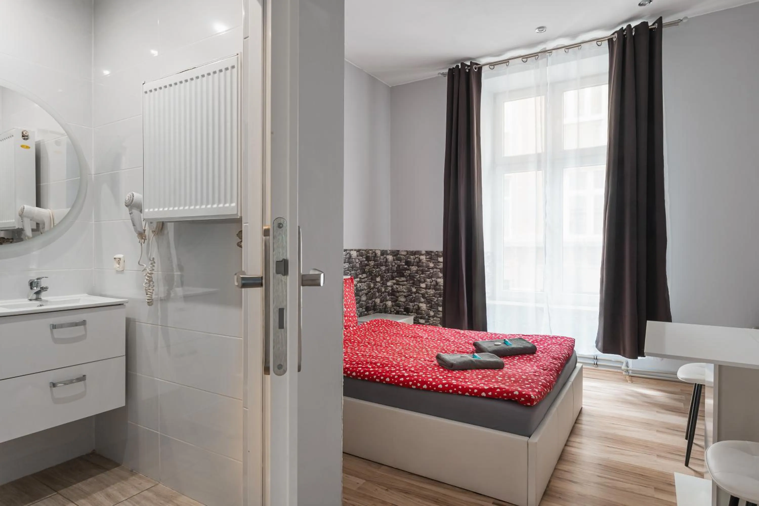 Bed in Queen Apartments