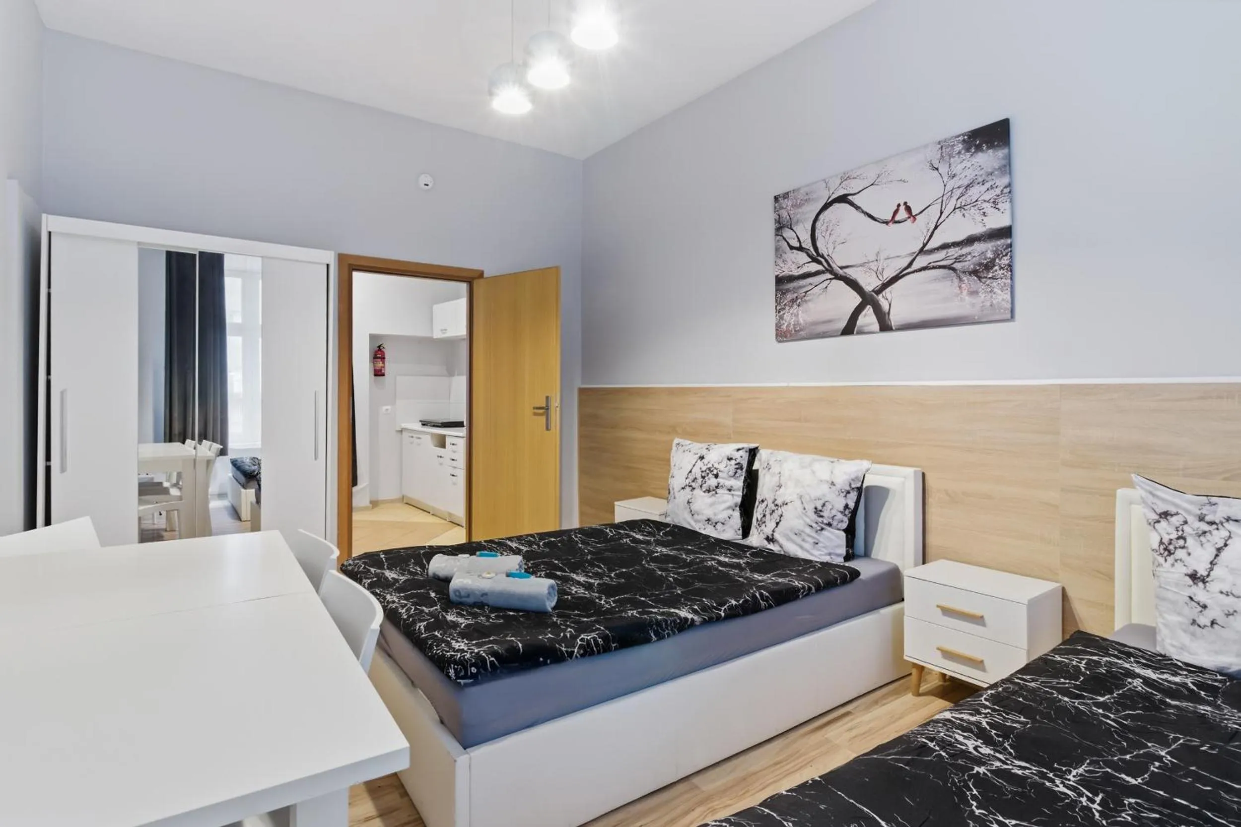 Bed in Queen Apartments