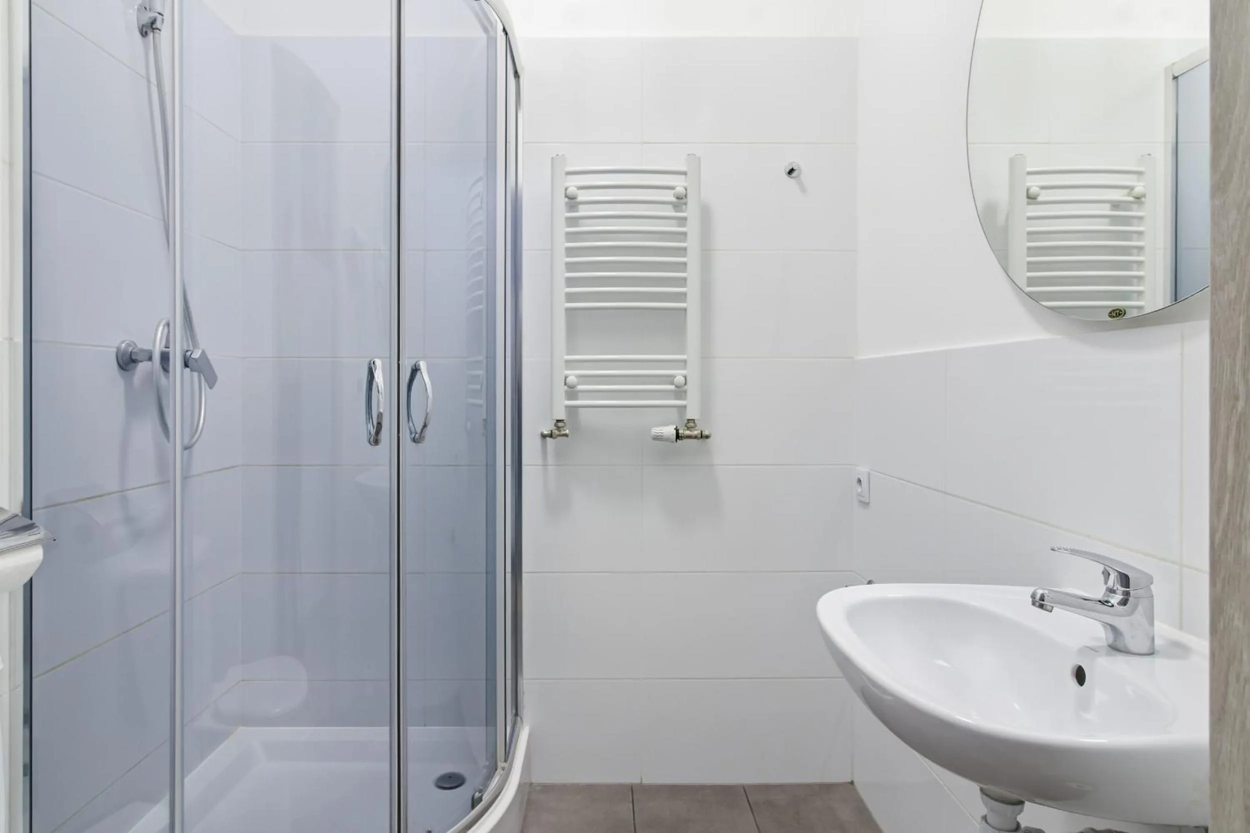 Shower in Queen Apartments