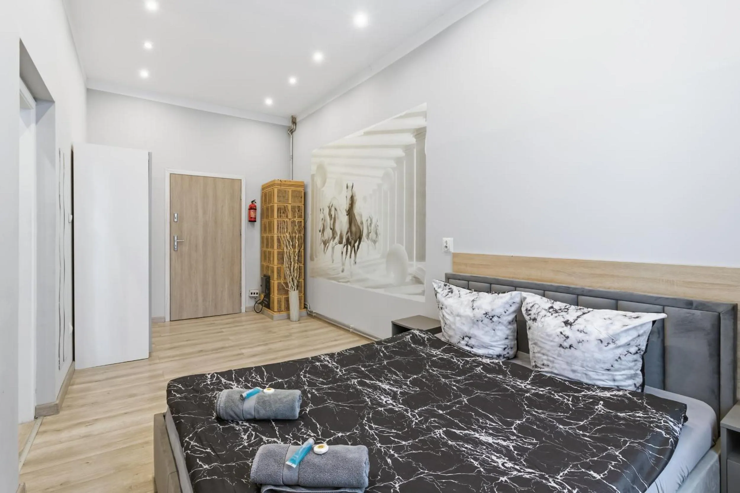 Bed in Queen Apartments