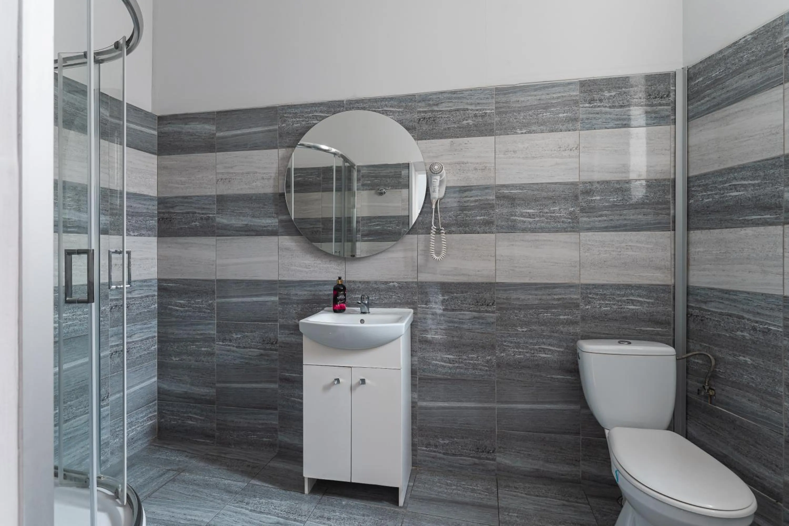 Shower in Queen Apartments