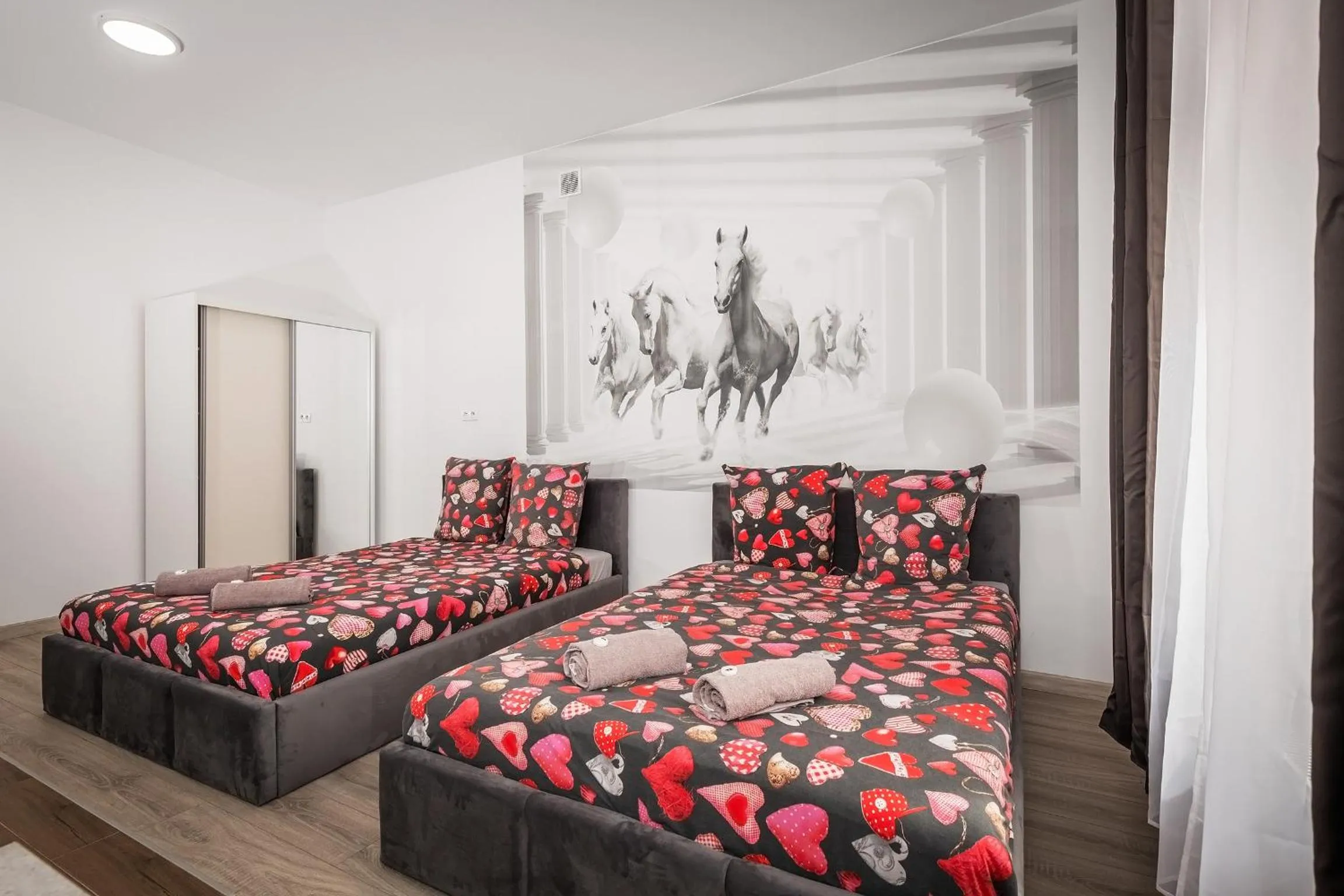 Bed in Queen Apartments