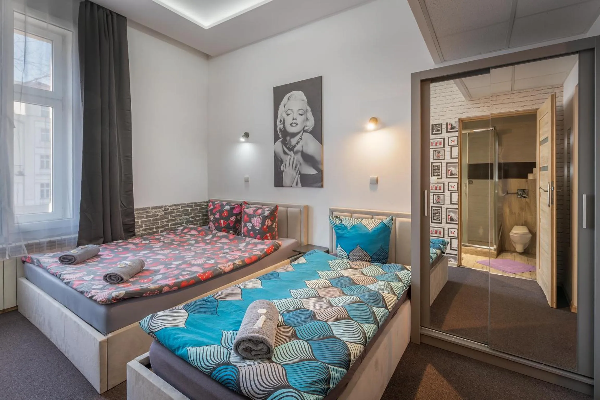 Bed in Queen Apartments