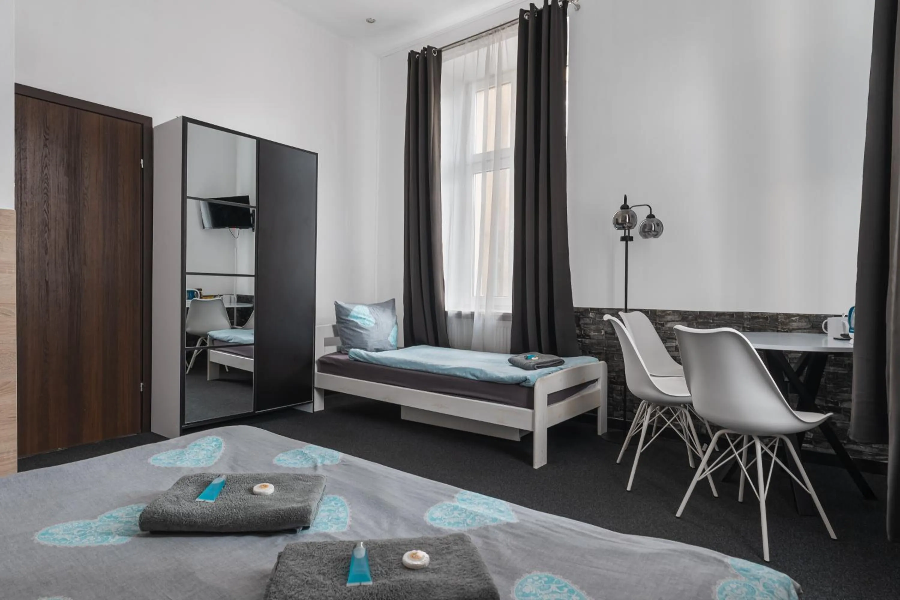 Bed in Queen Apartments