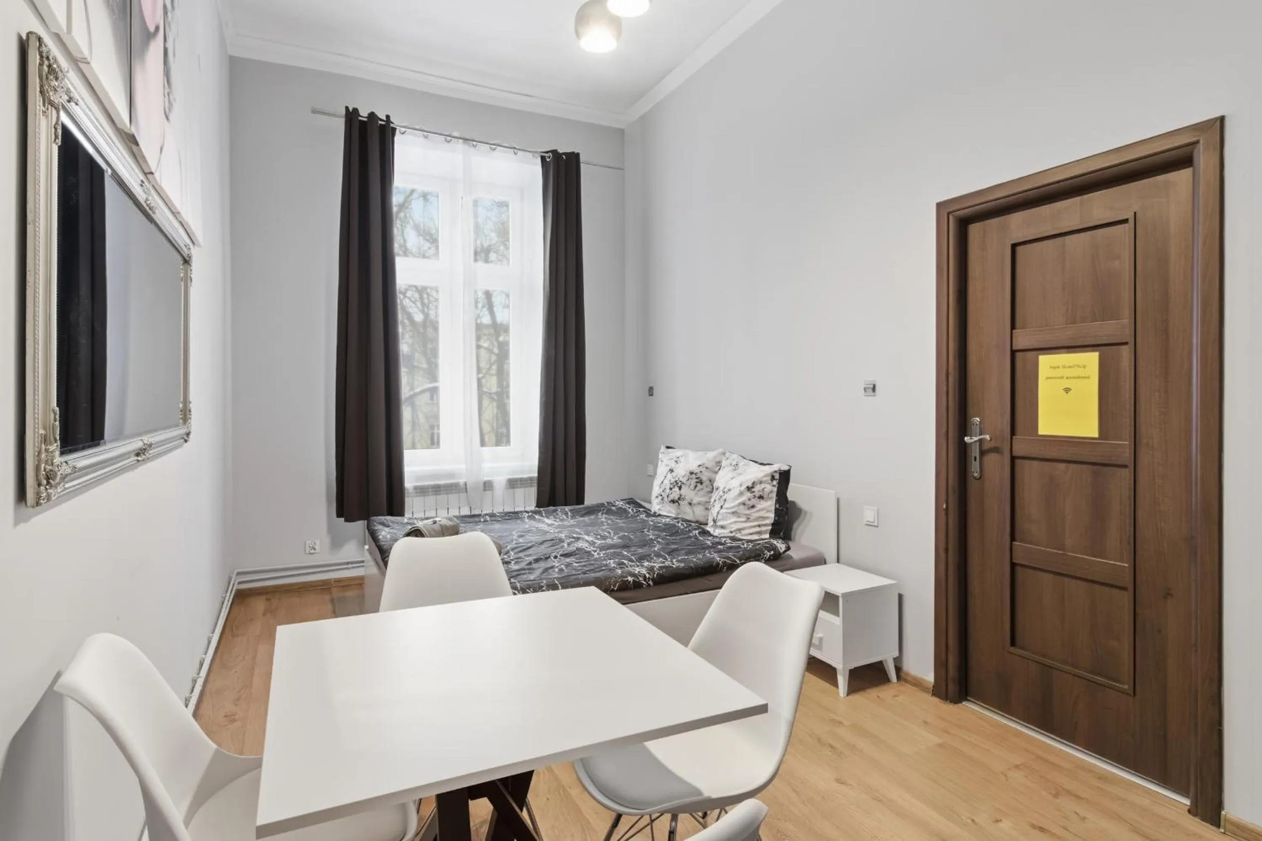 Bed in Queen Apartments