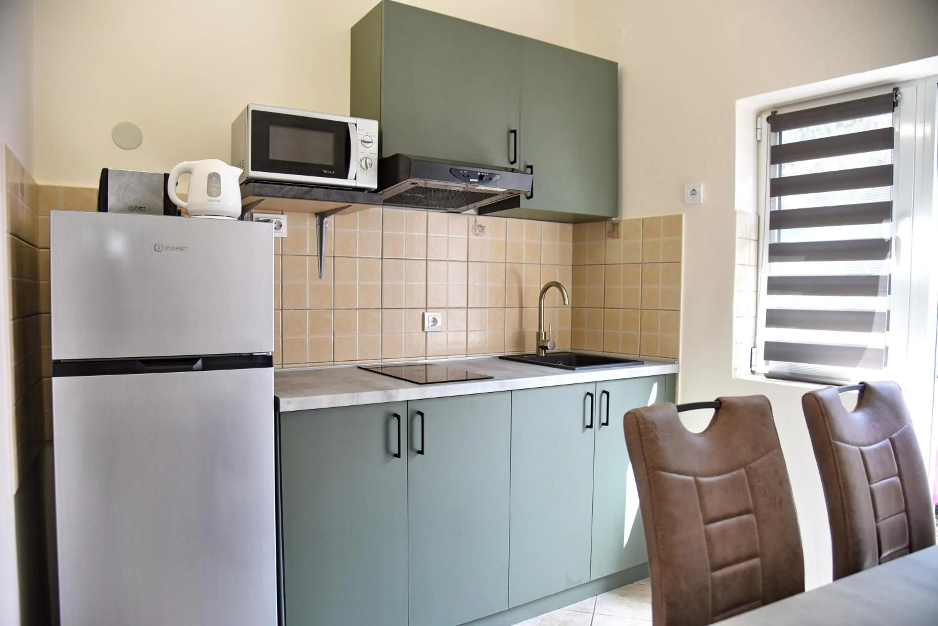 Kitchen or kitchenette in Apartments PEGAZ