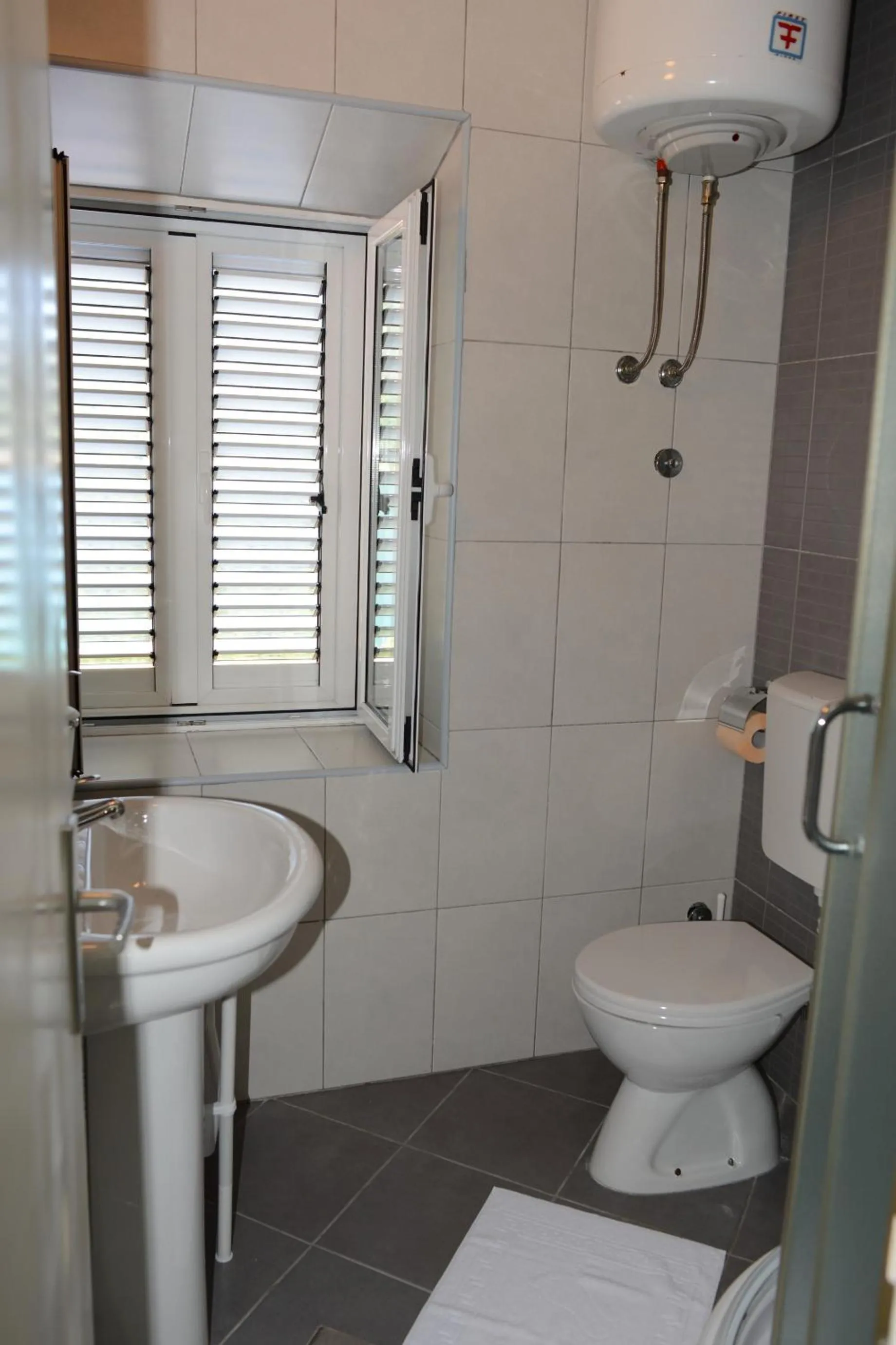 Bathroom in Apartments PEGAZ