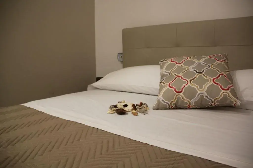 Bed in Residenza Suarez Bed in Residenza Suarez