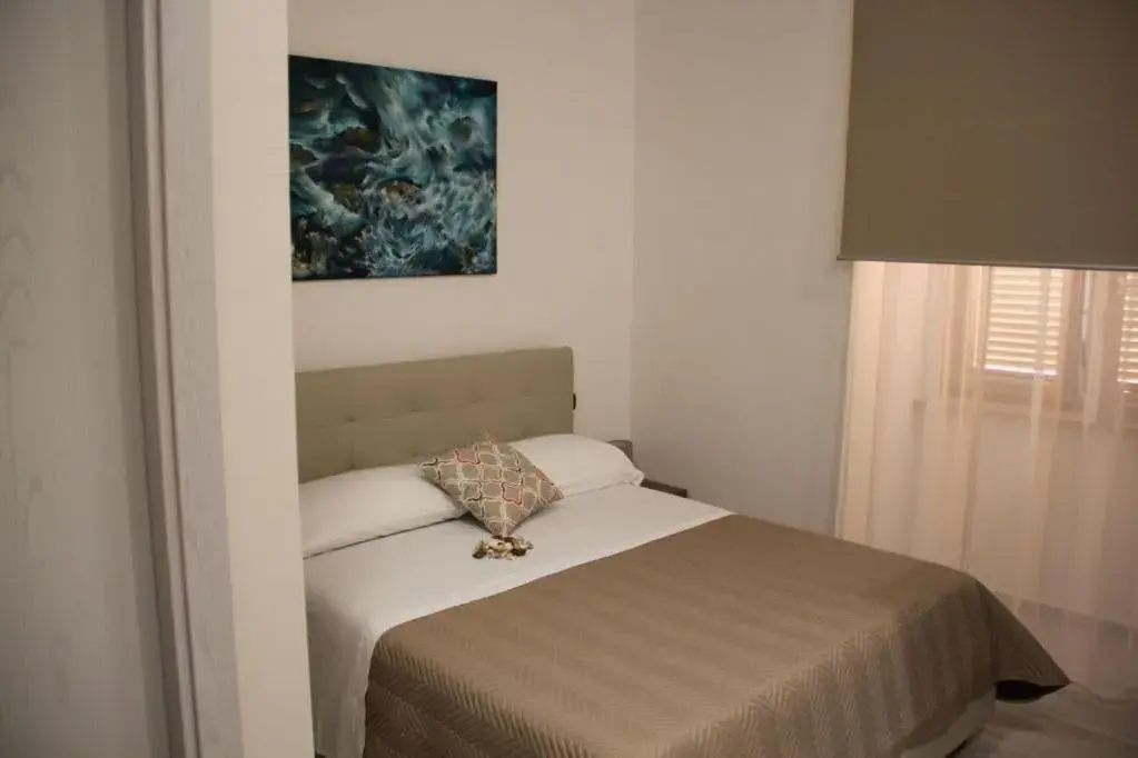 Bed in Residenza Suarez Bed in Residenza Suarez