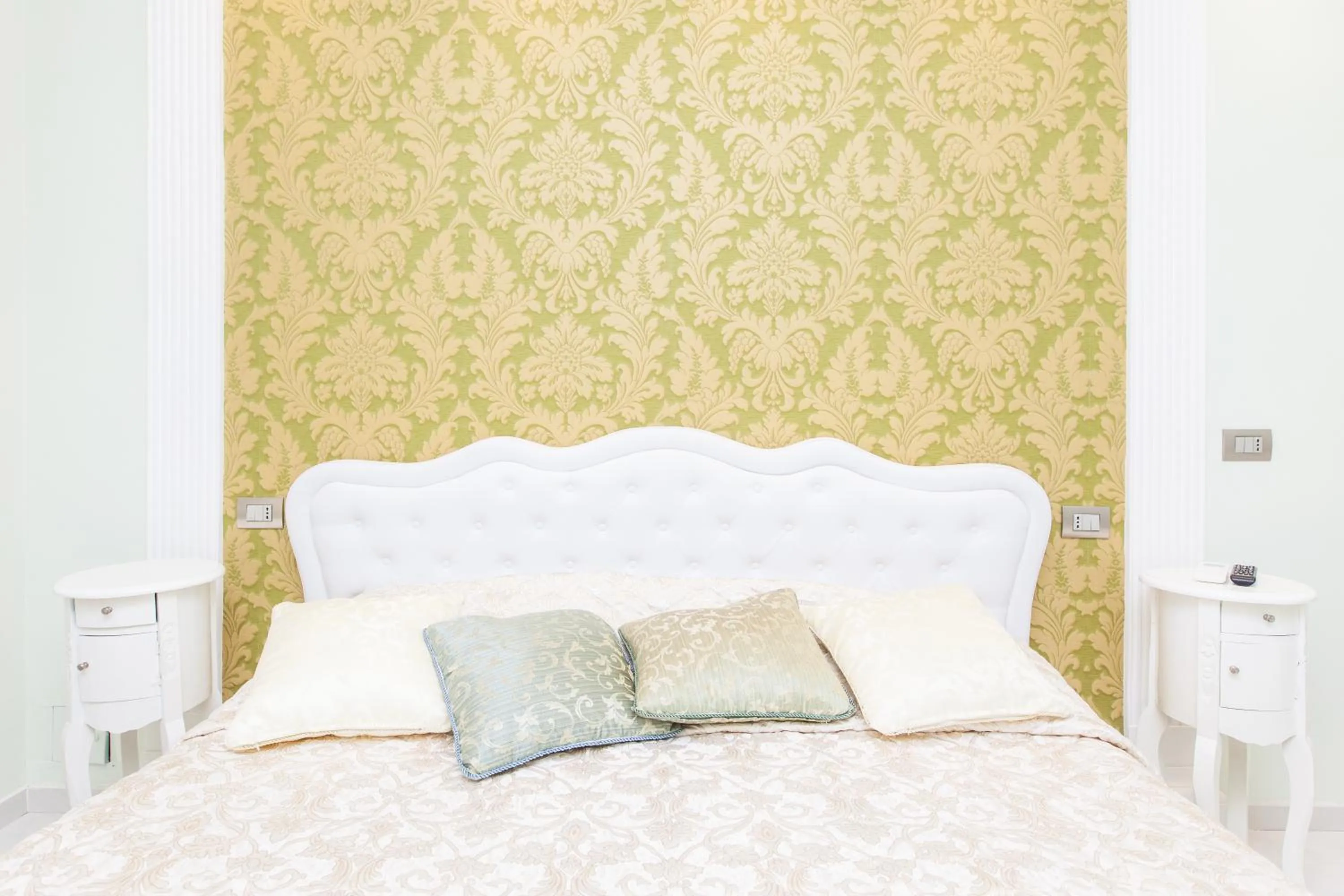 Decorative detail, Bed in Impero Vaticano San Pietro