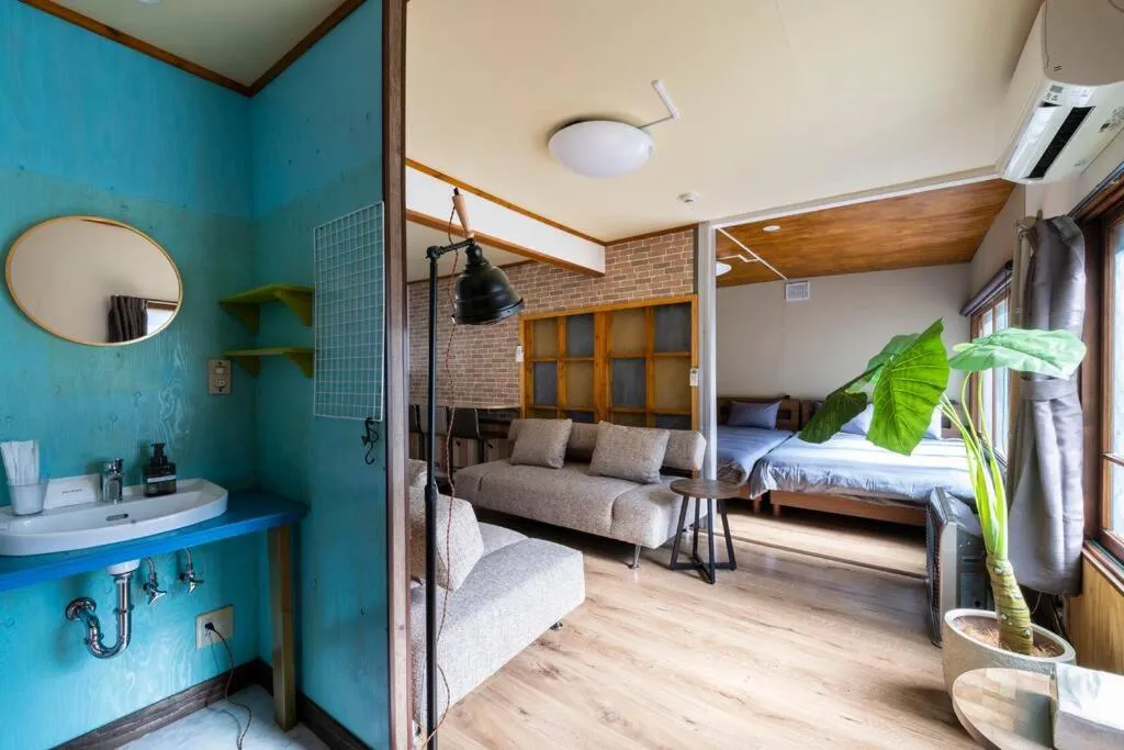 Living room, Bed in YADOt Inn OTARU