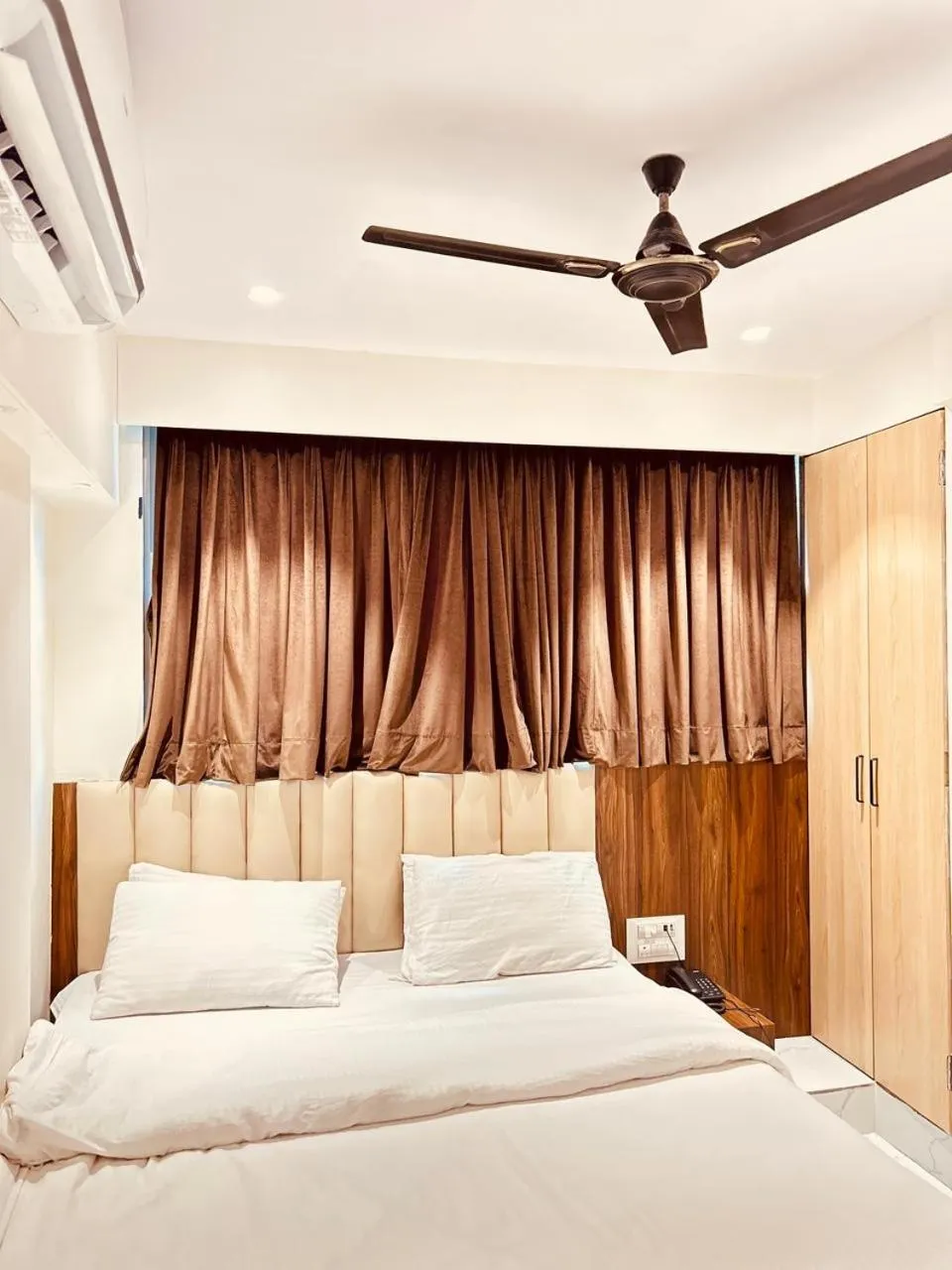 Bed in Prince NX Hotel