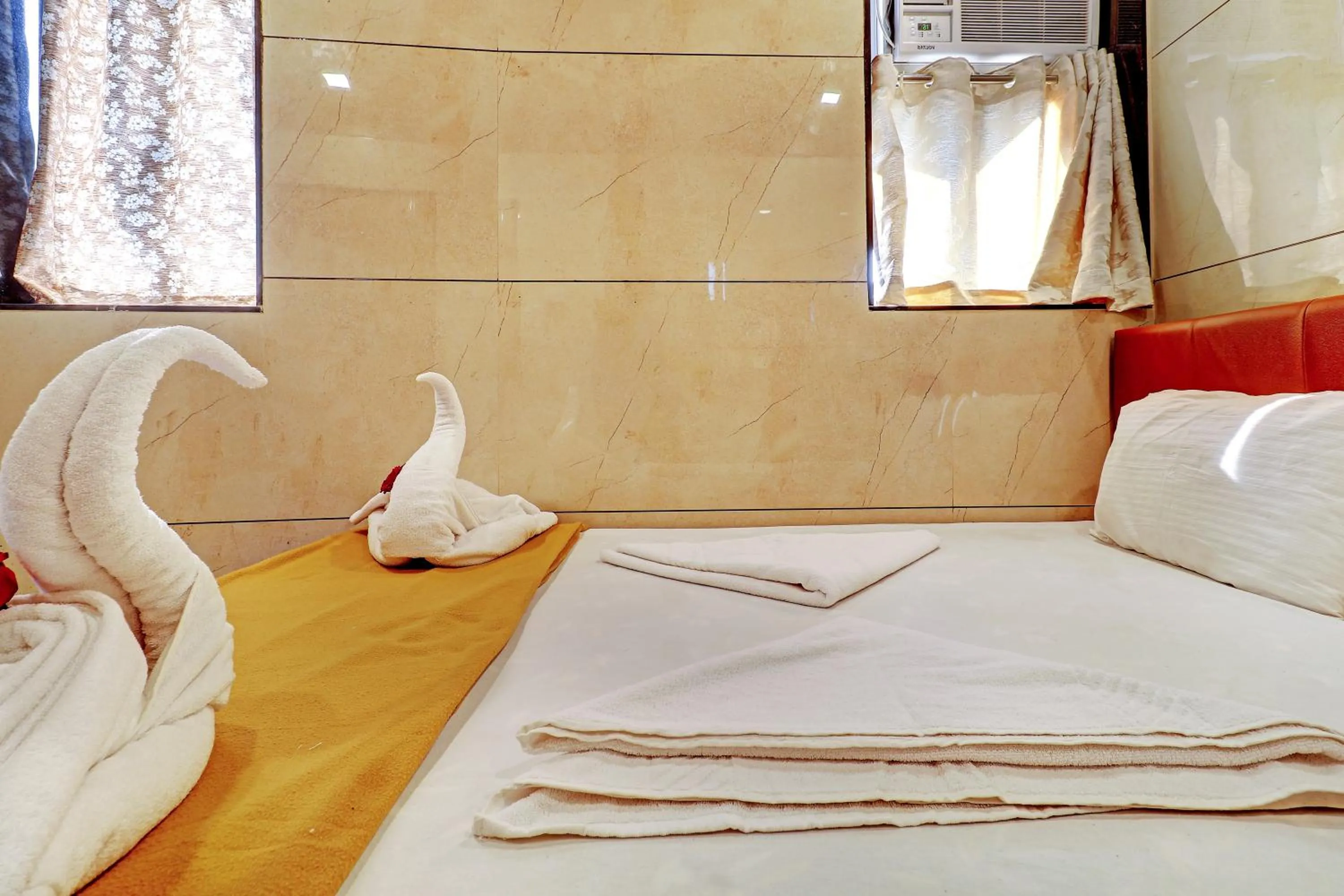 Bed in Prince NX Hotel