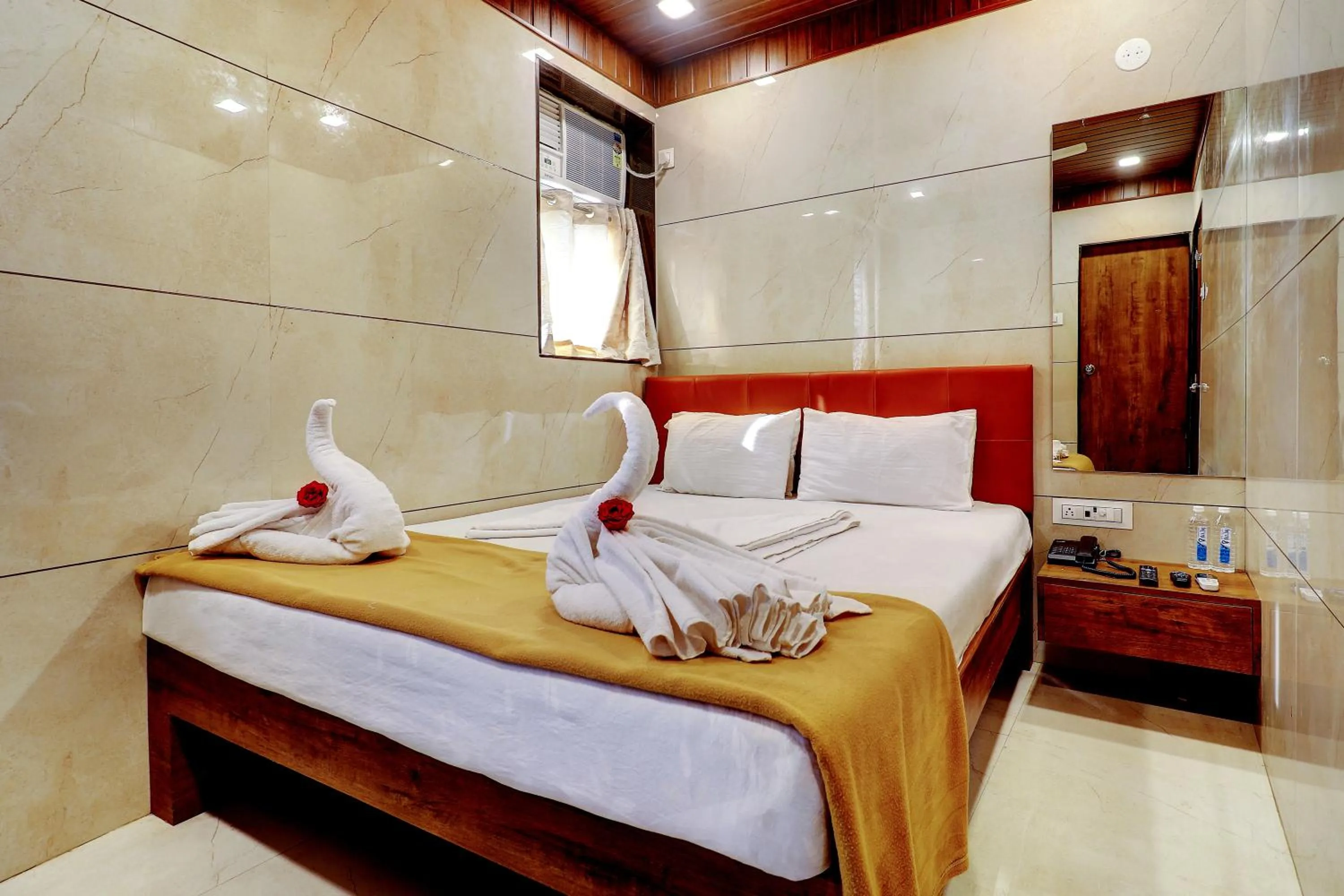 Bed in Prince NX Hotel