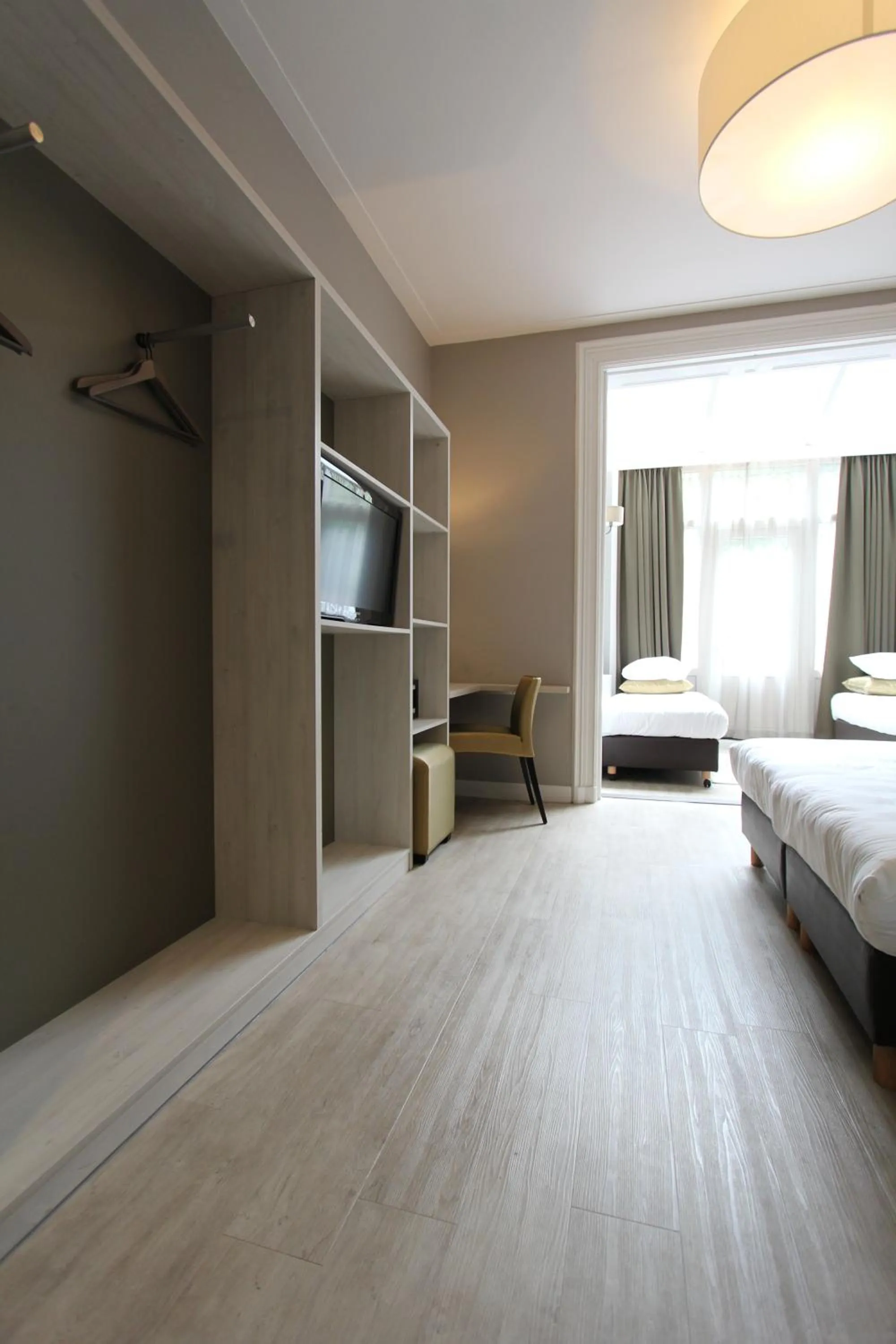 Photo of the whole room, Bed in Apple Inn Hotel