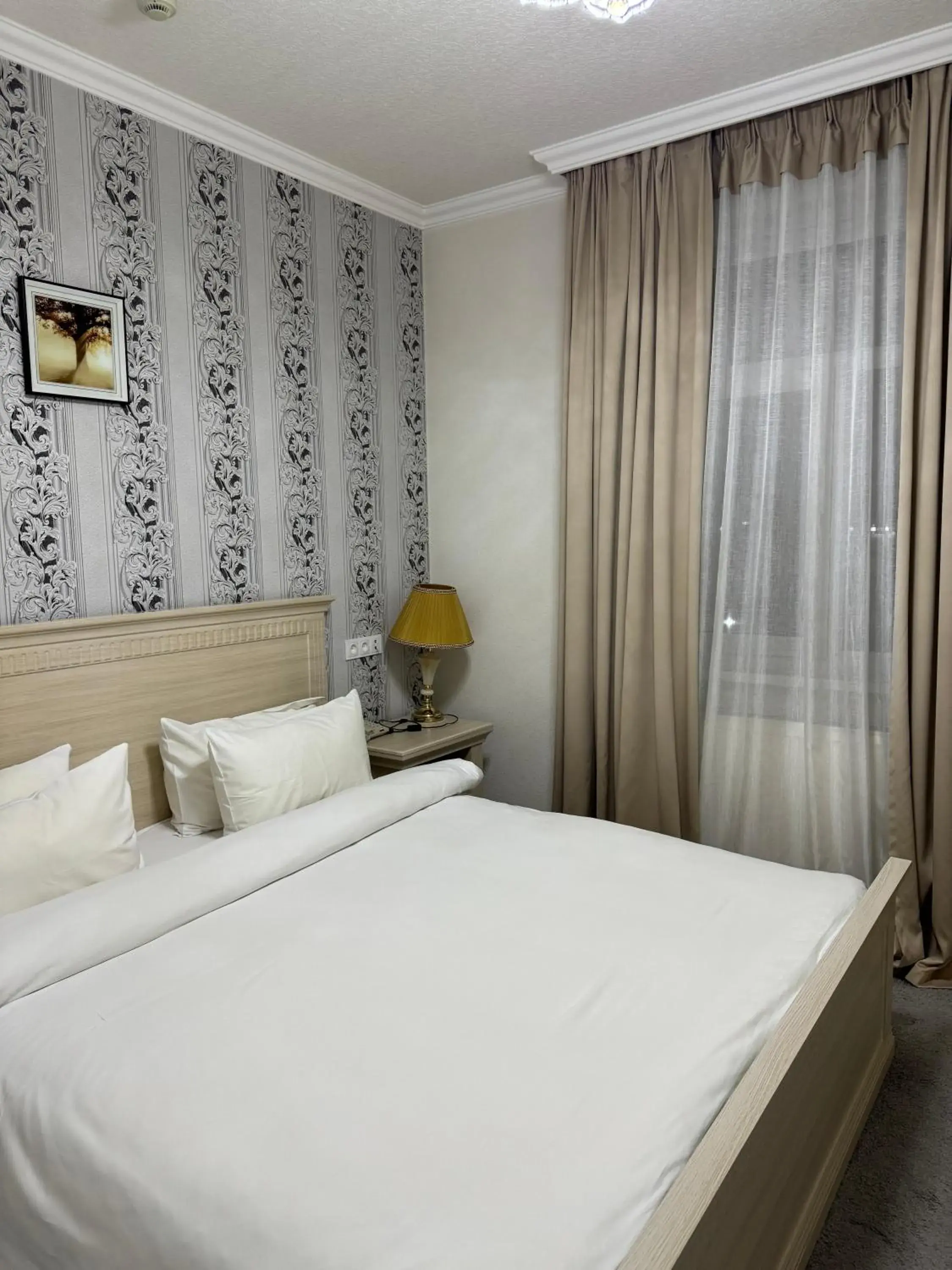 Bed in Alexander Hotel Bed in Alexander Hotel