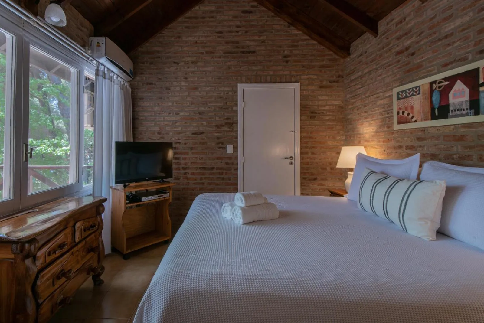 Bed in Carilo Village Apart Hotel & Spa