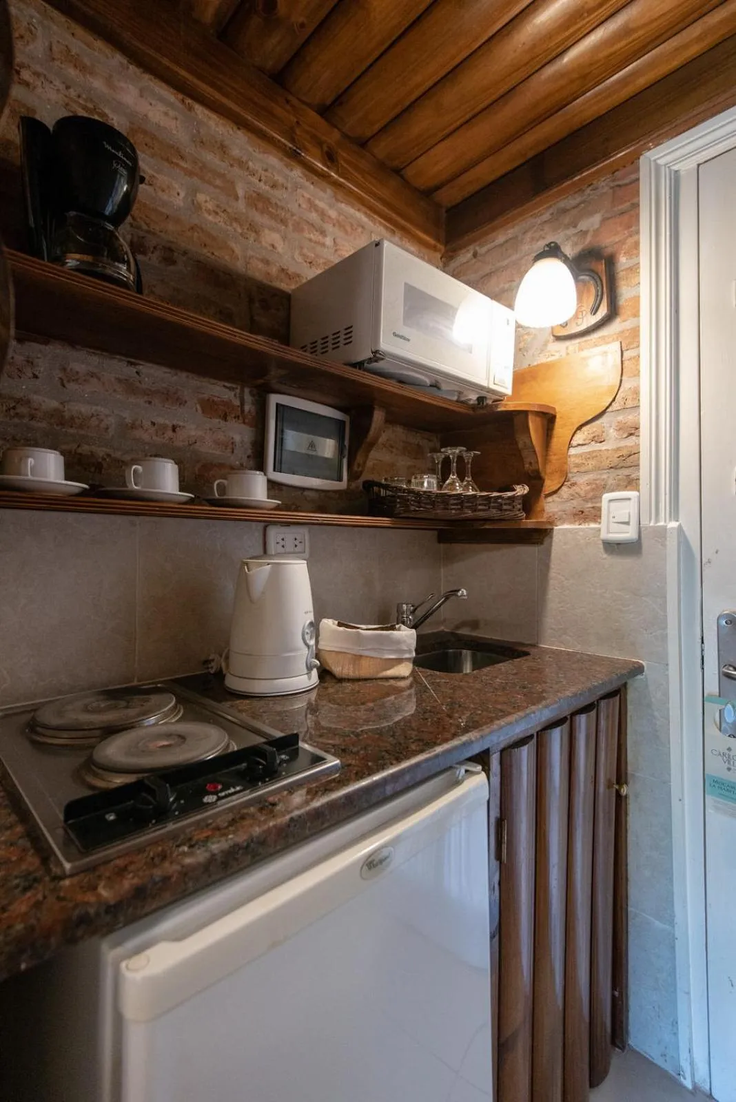 kitchen in Carilo Village Apart Hotel & Spa