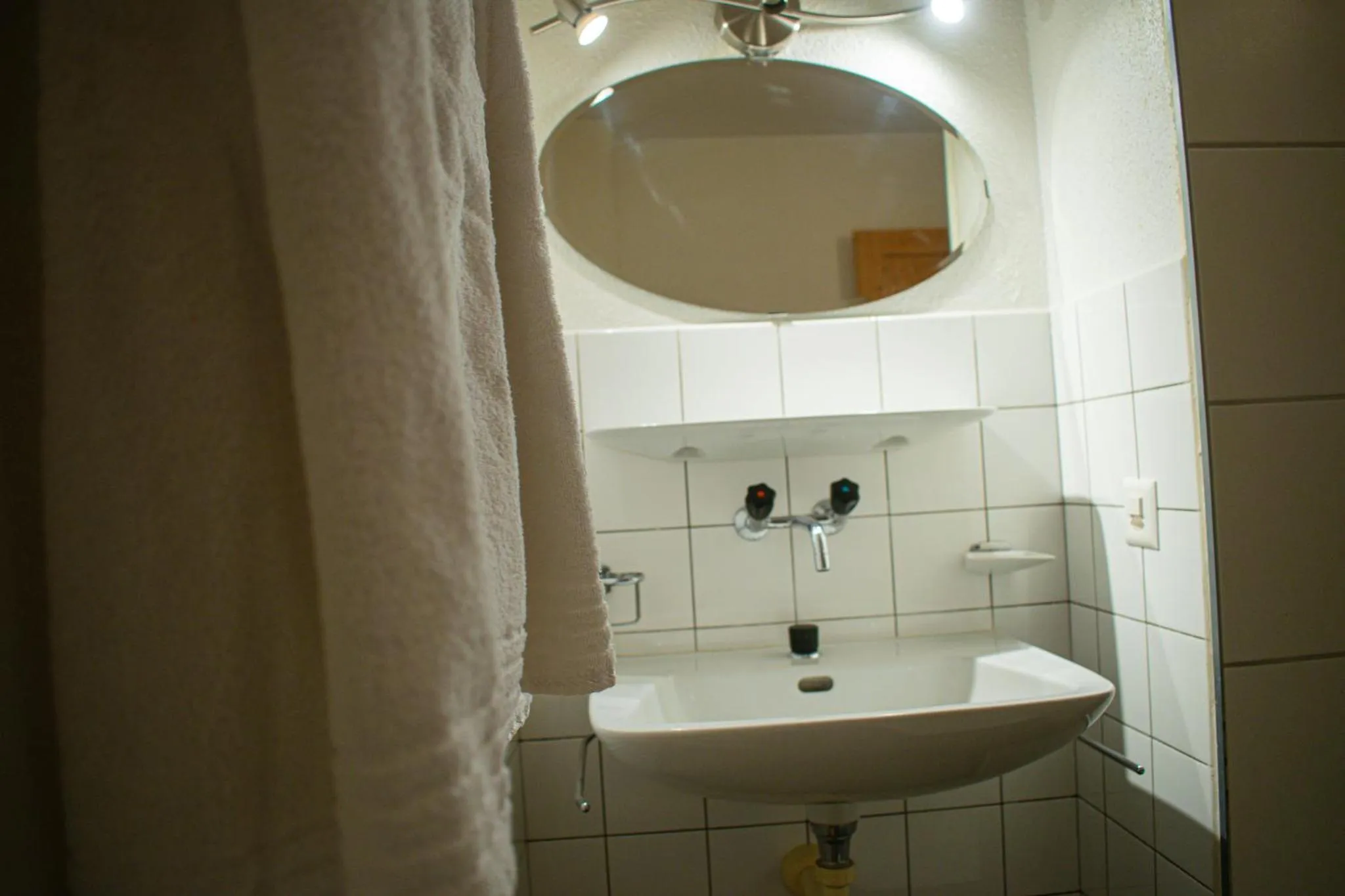 Bathroom in Hotel Malixerhof