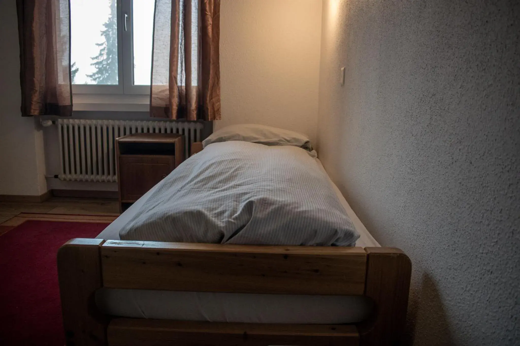 Bed in Hotel Malixerhof Bed in Hotel Malixerhof