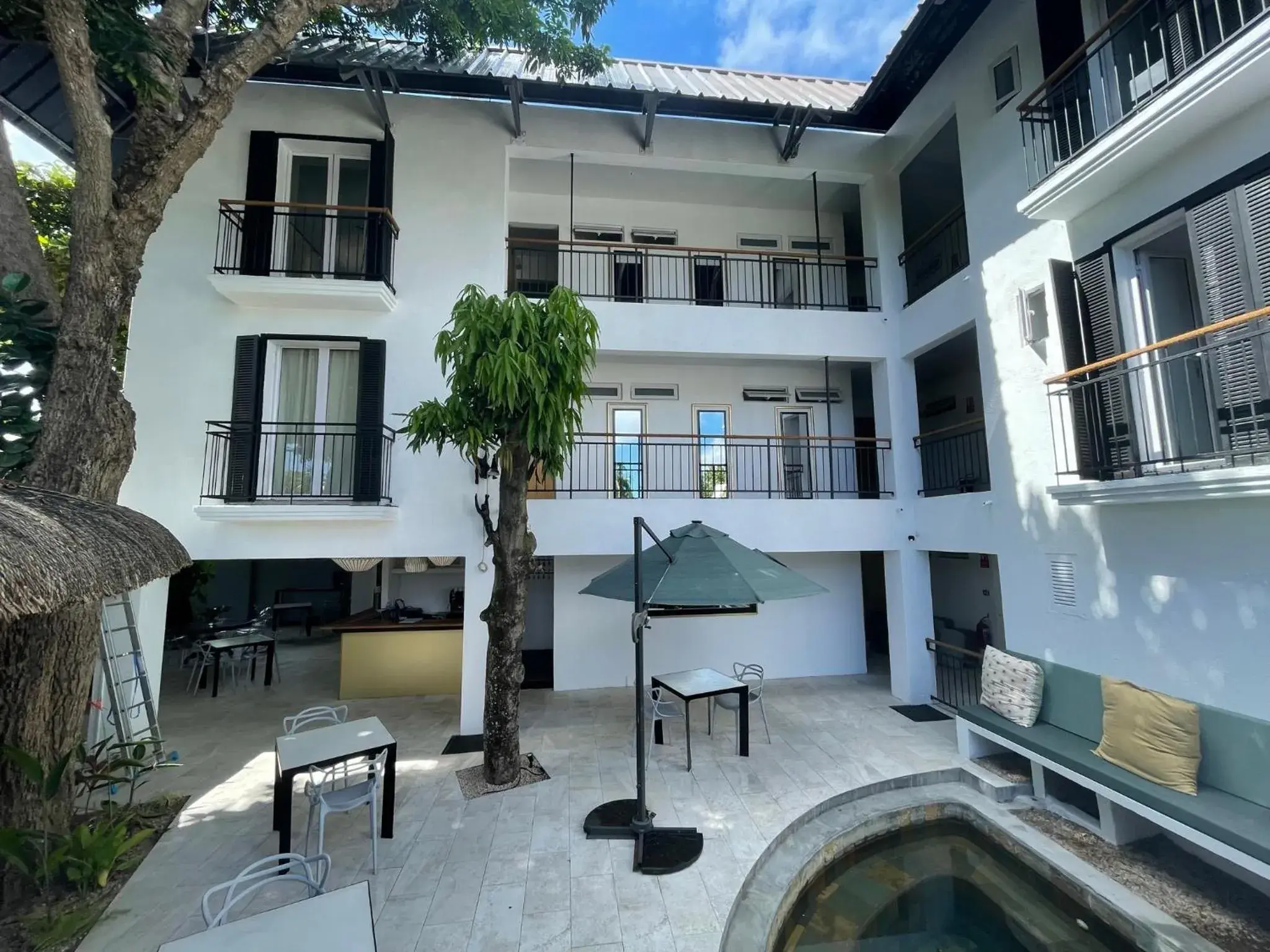 Property building in Cosy Guest House Sous le Badamier Property building in Cosy Guest House Sous le Badamier