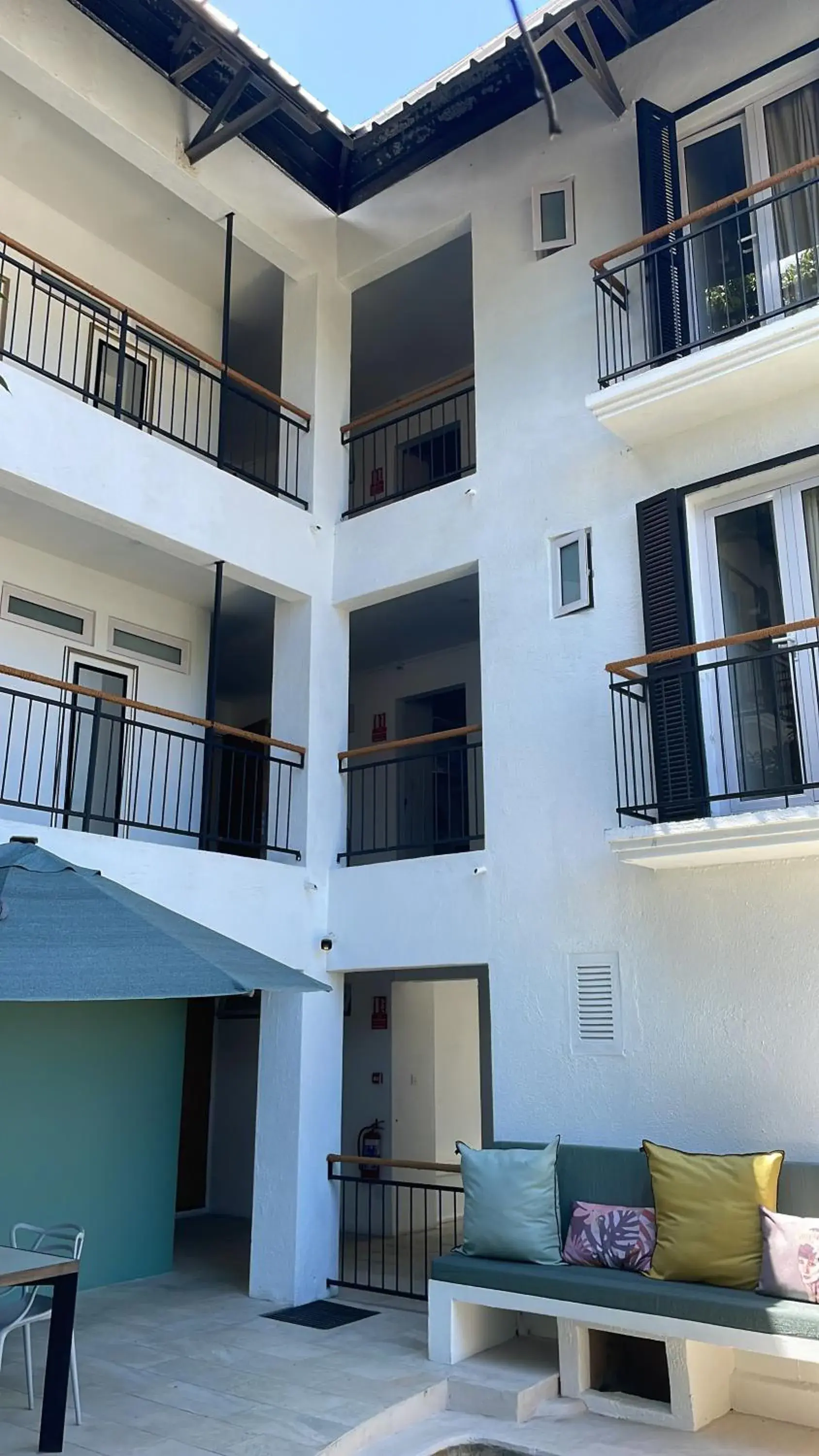 Property building in Cosy Guest House Sous le Badamier Property building in Cosy Guest House Sous le Badamier