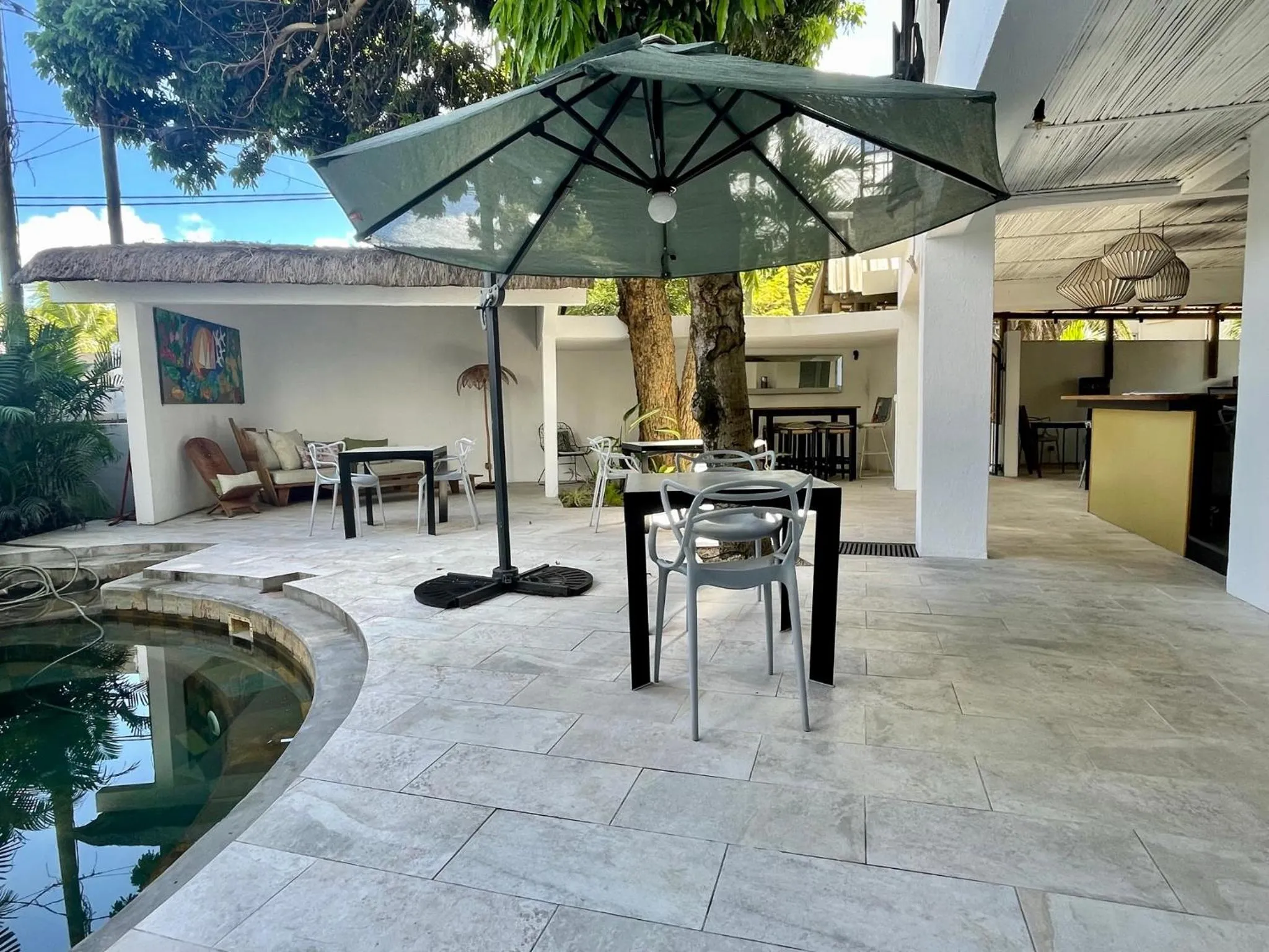 Patio in Cosy Guest House Sous le Badamier