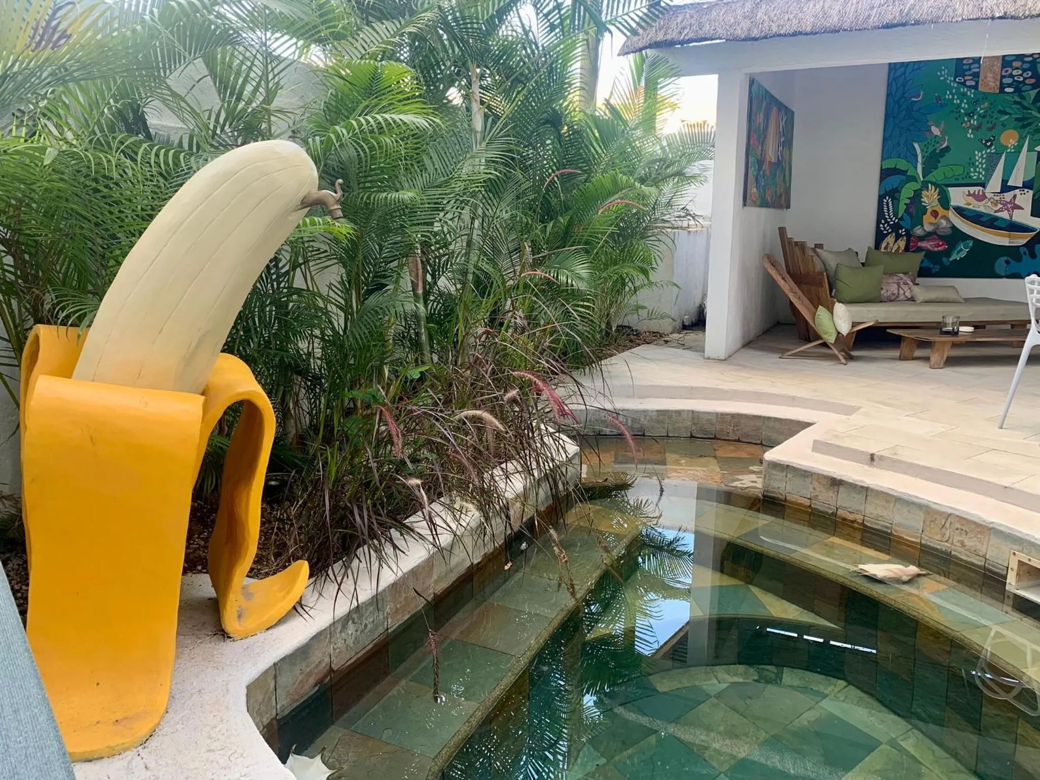 Patio in Cosy Guest House Sous le Badamier