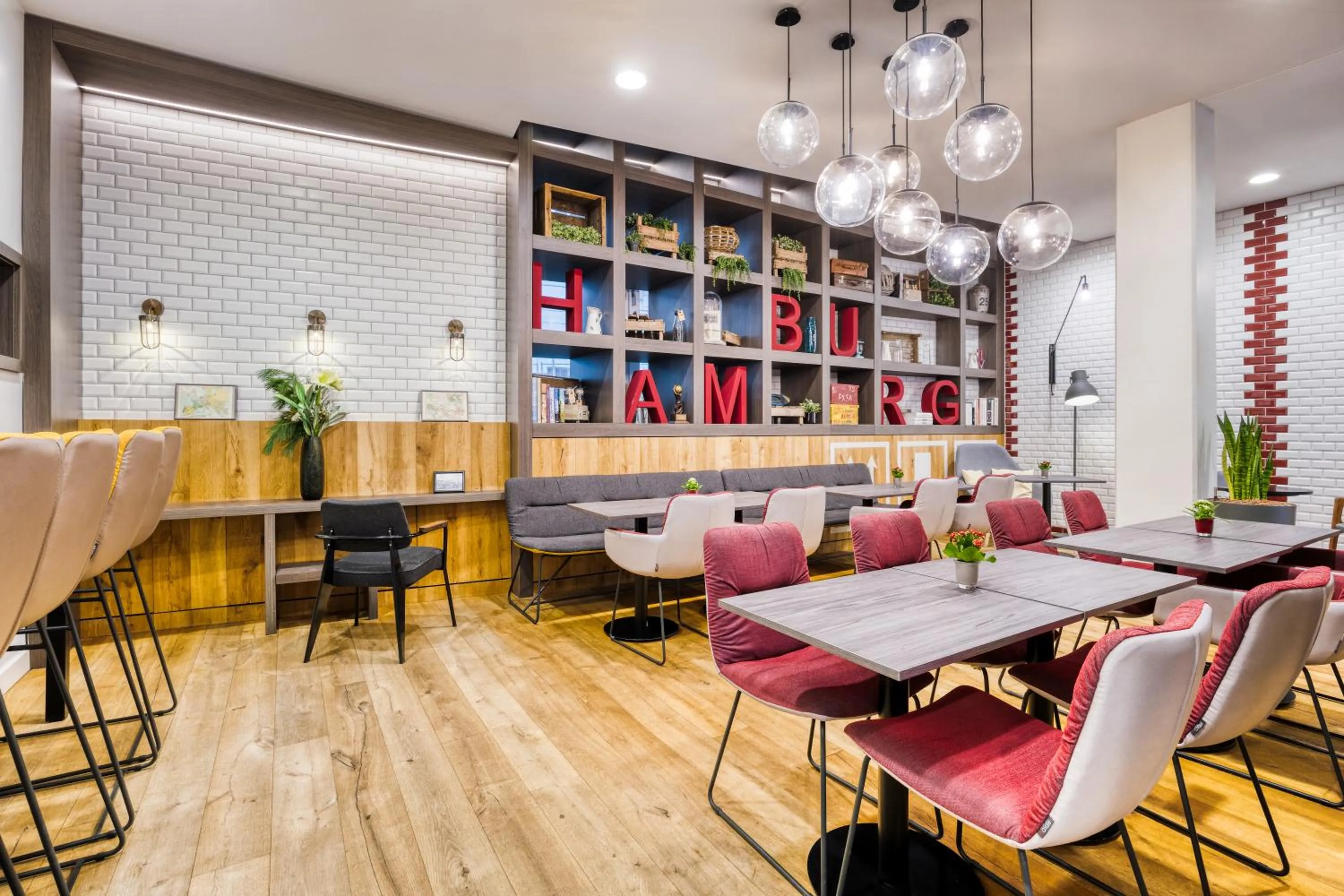 Communal lounge/ TV room in Citadines Michel Hamburg