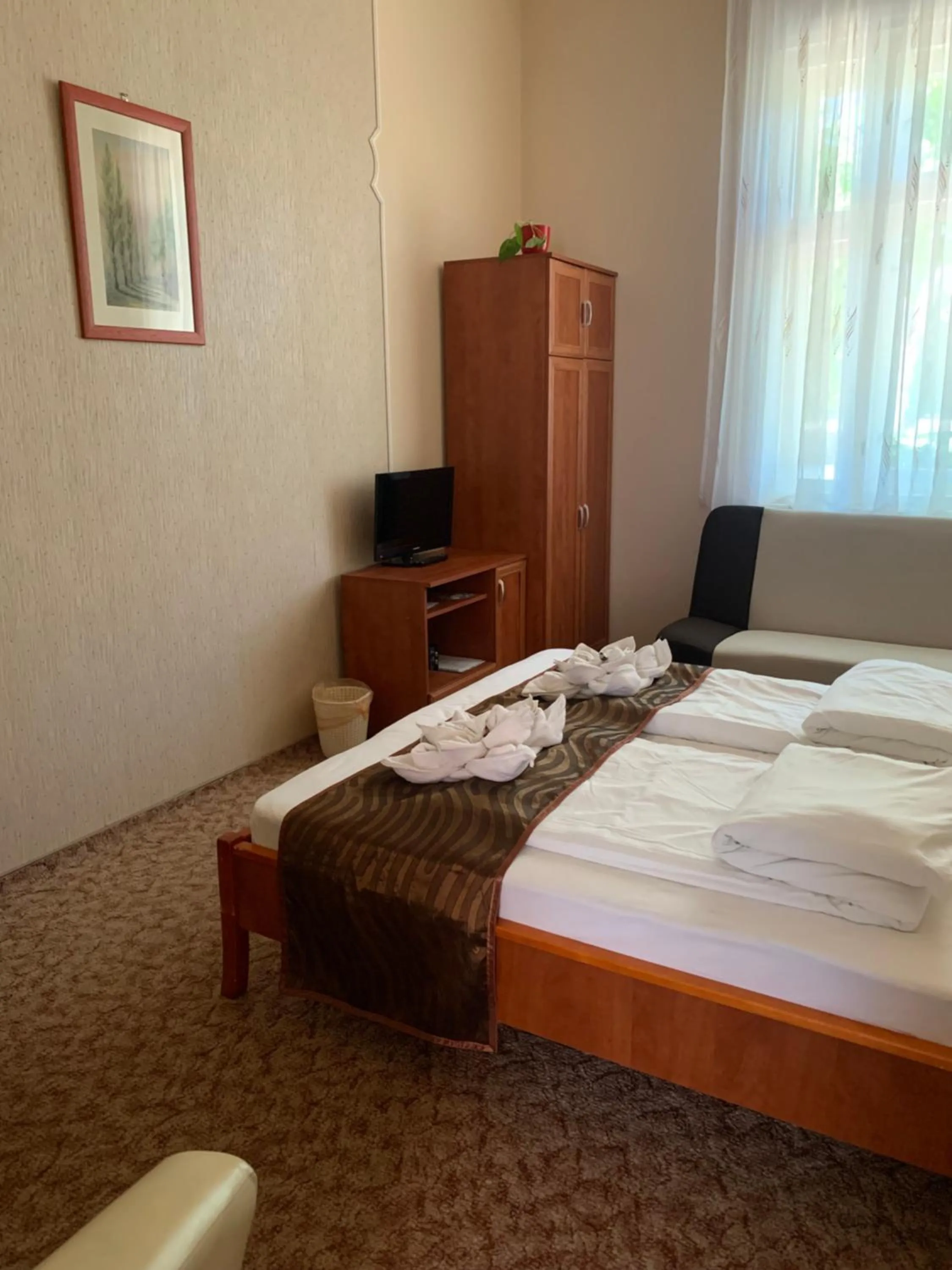 Bed in Szent István Wellness Panzió