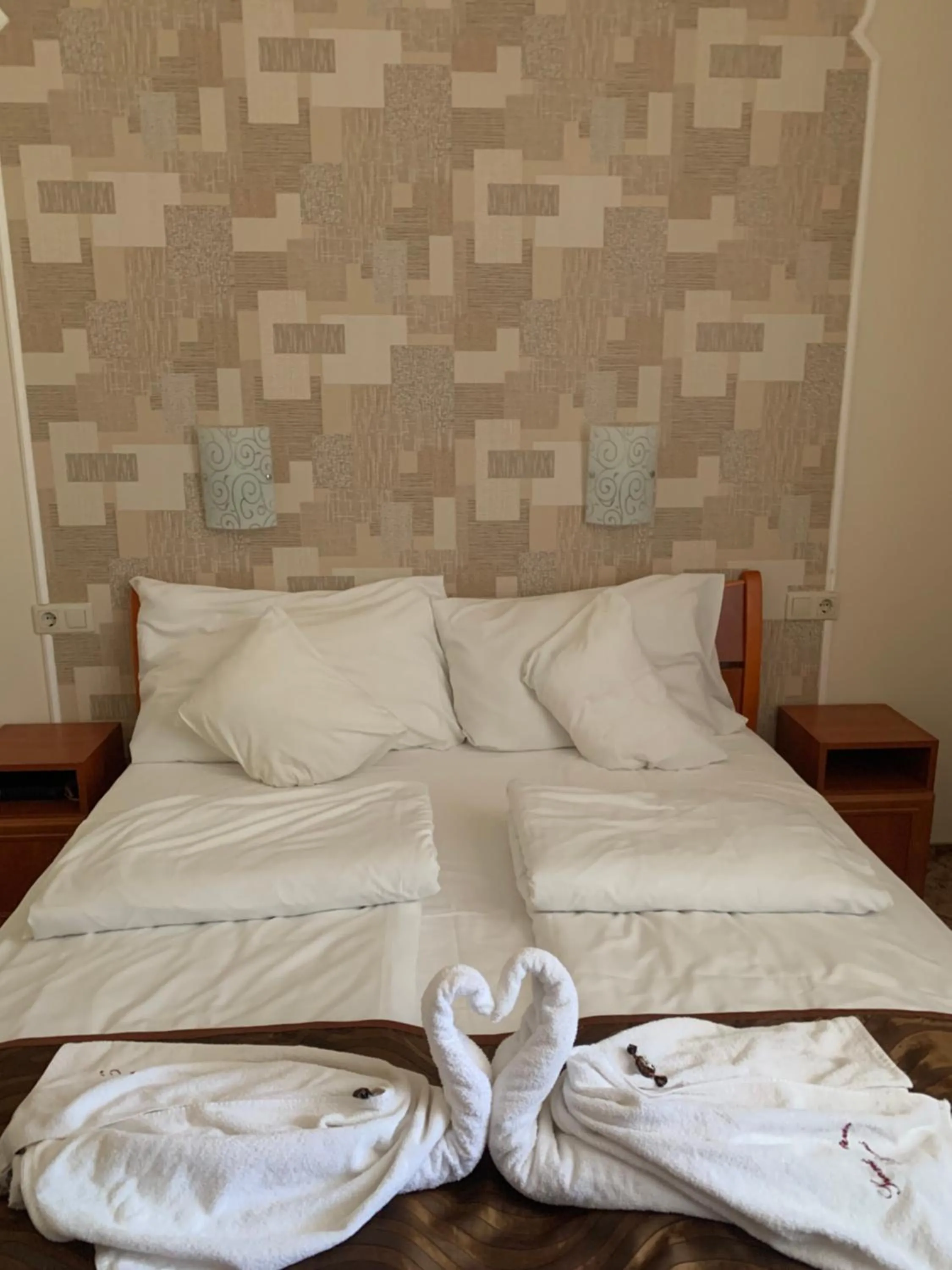 Bed in Szent István Wellness Panzió