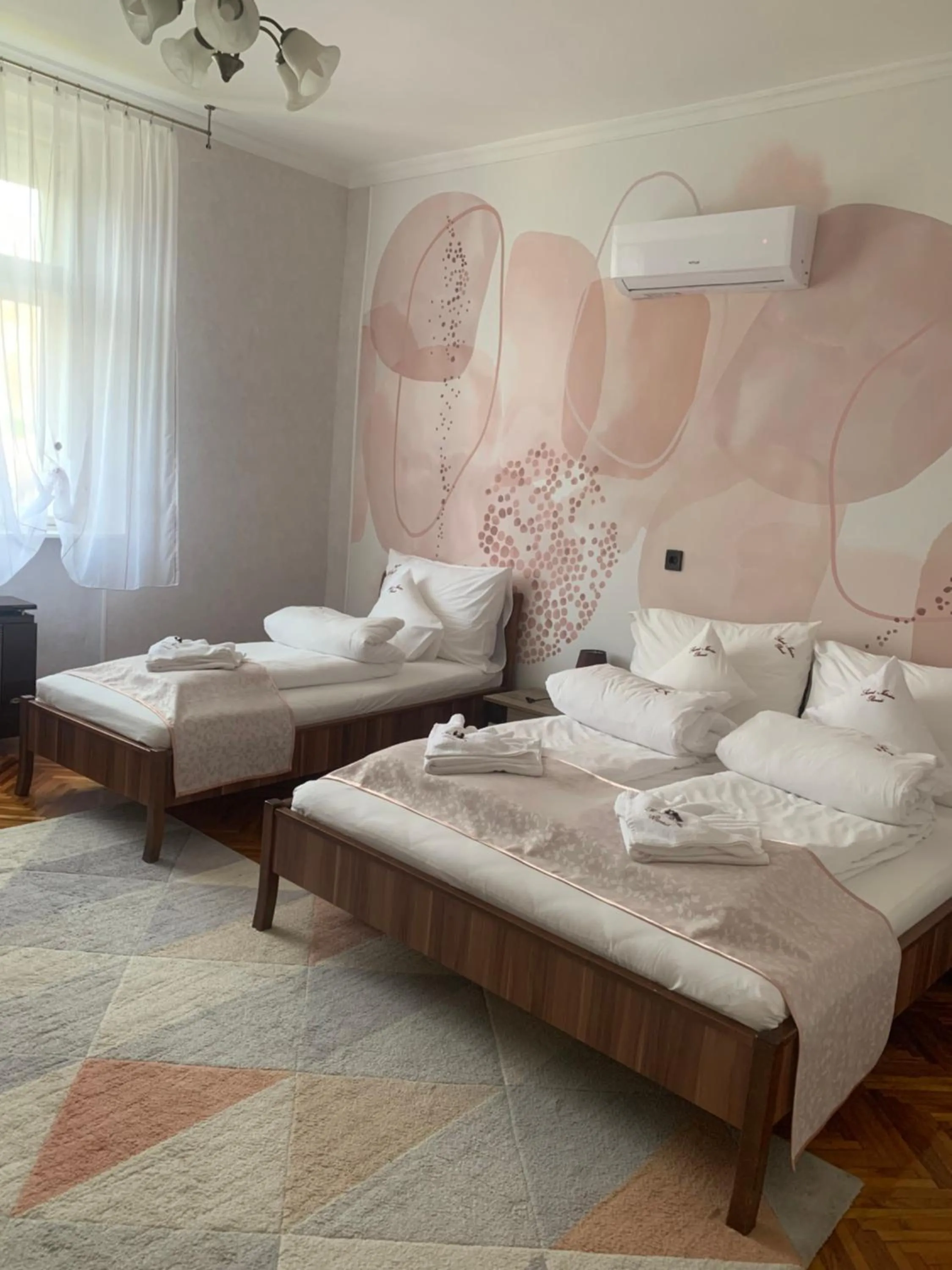 Bed in Szent István Wellness Panzió