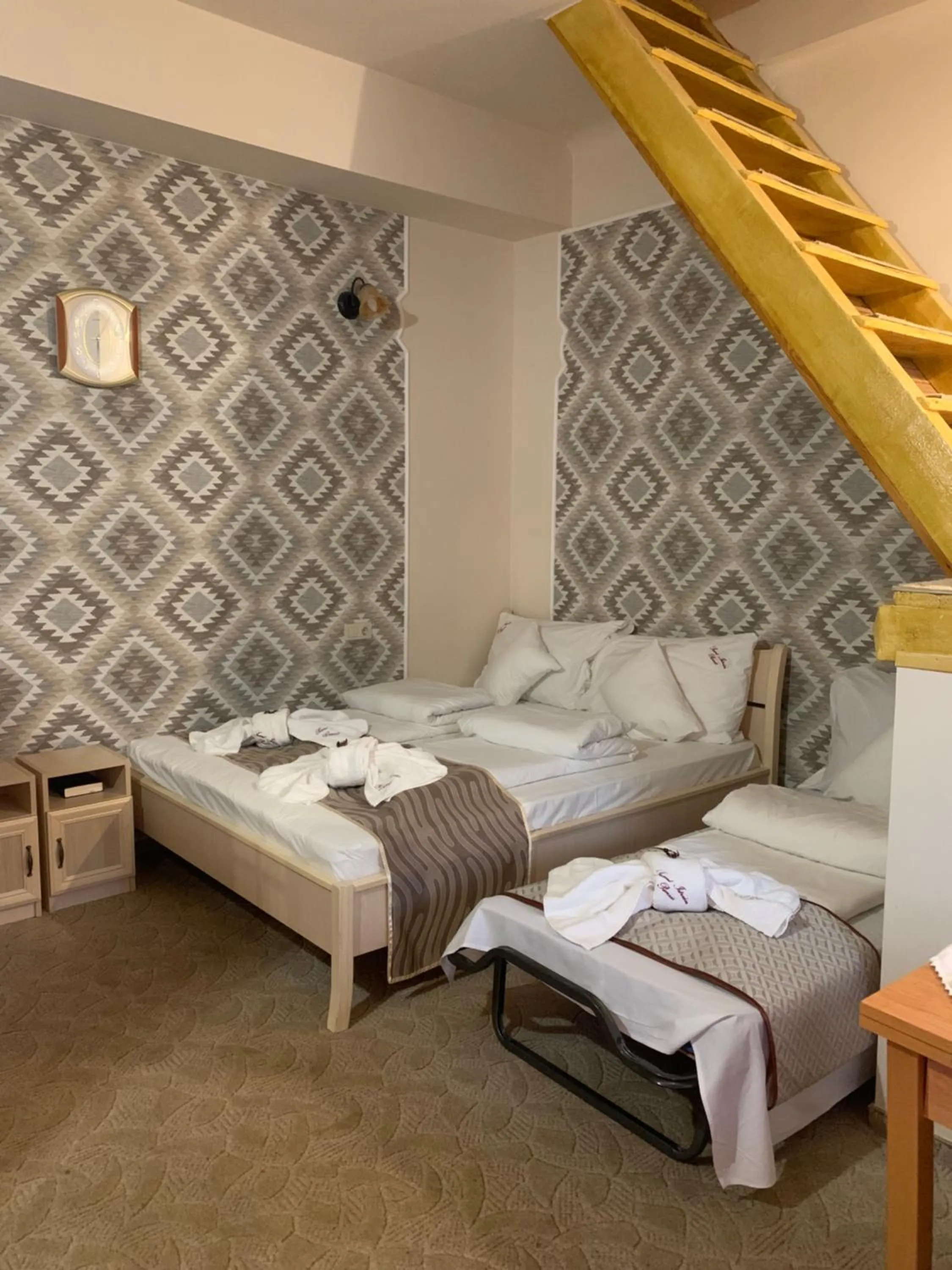 Bed in Szent István Wellness Panzió