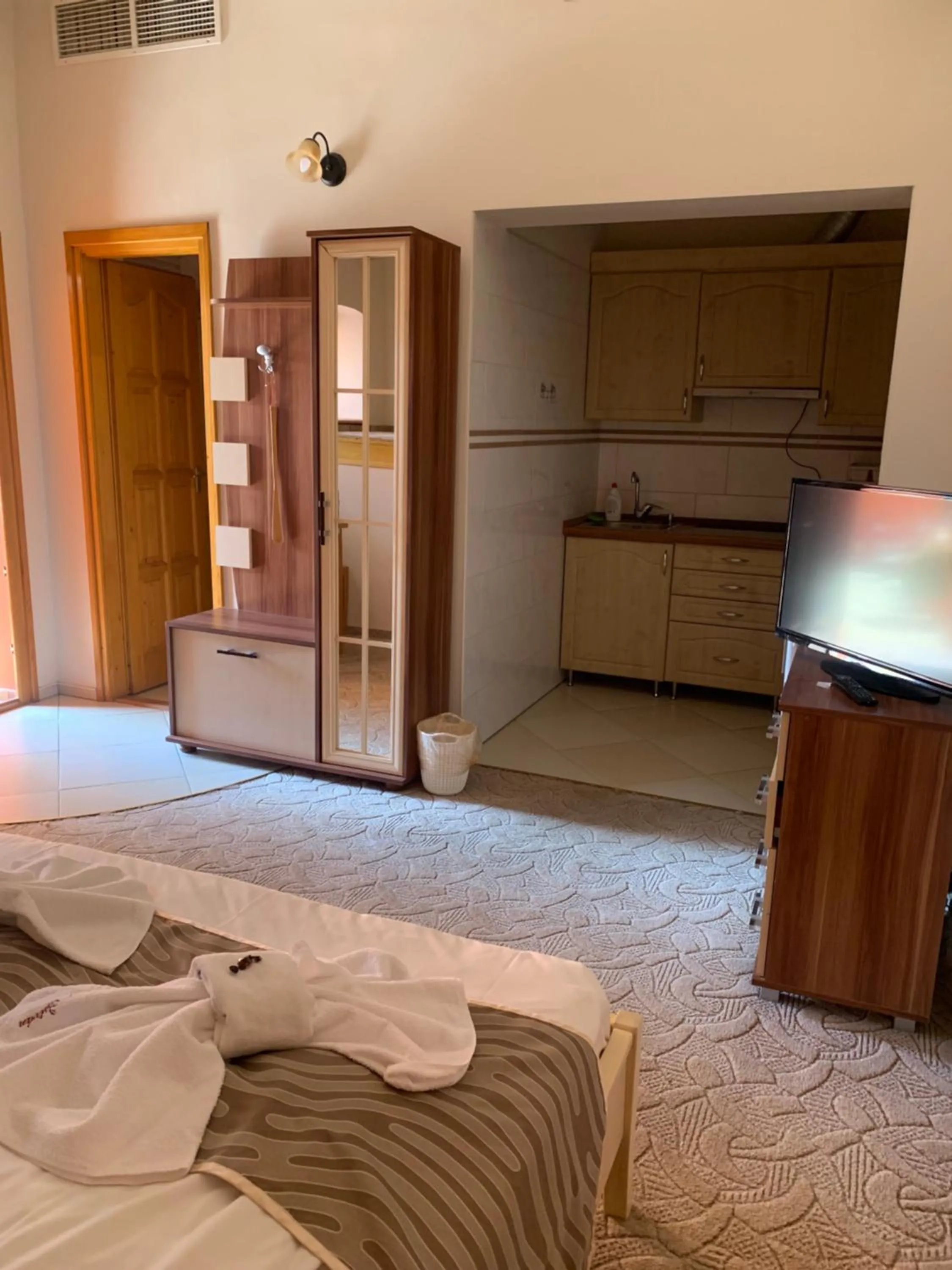Kitchen or kitchenette, Bed in Szent István Wellness Panzió