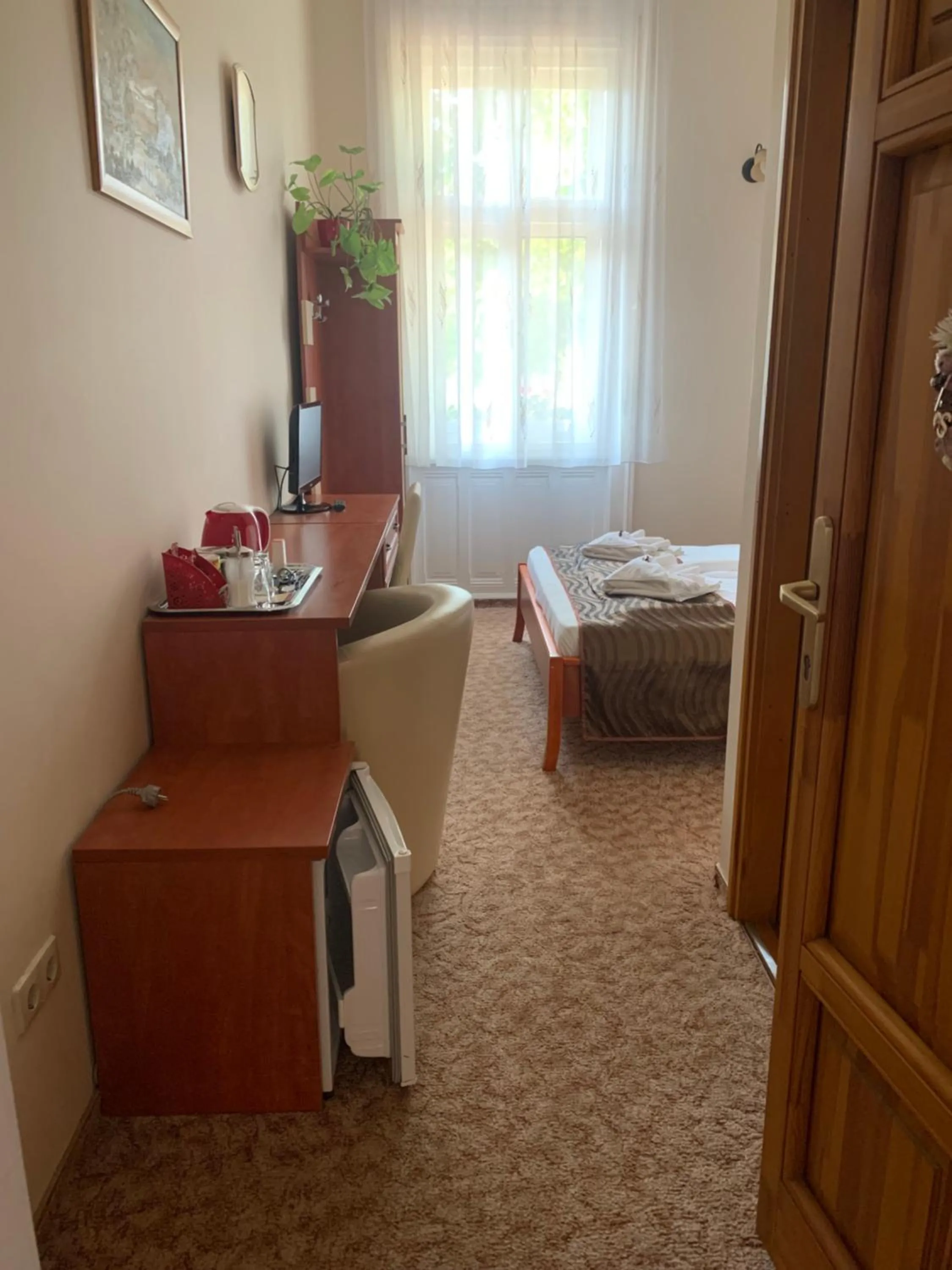 Photo of the whole room, Bed in Szent István Wellness Panzió