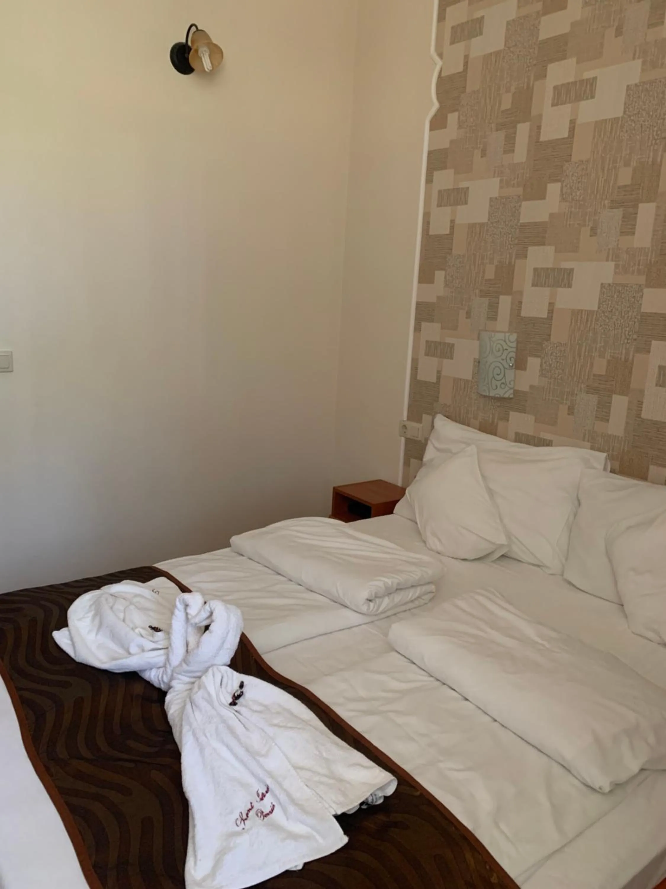 Bed in Szent István Wellness Panzió