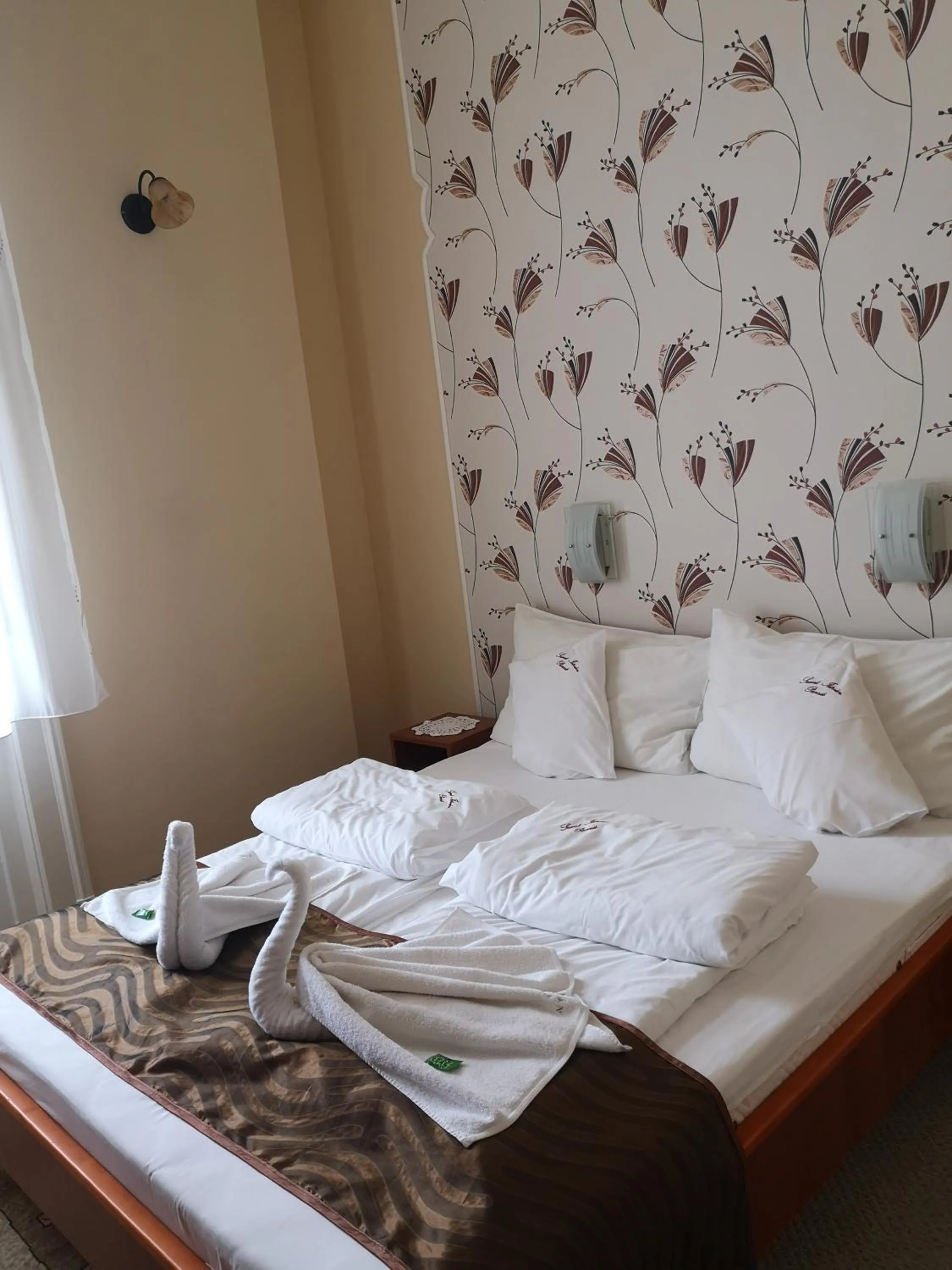 Bed in Szent István Wellness Panzió
